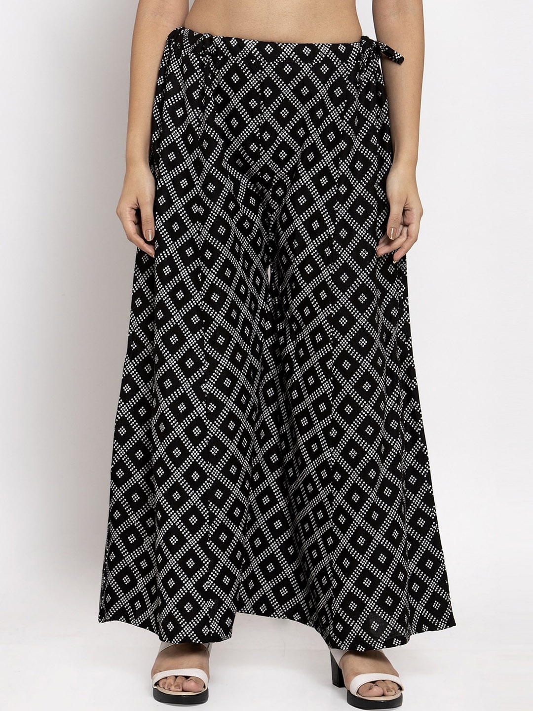 

Clora Creation Women Black & White Printed Flared Palazzos