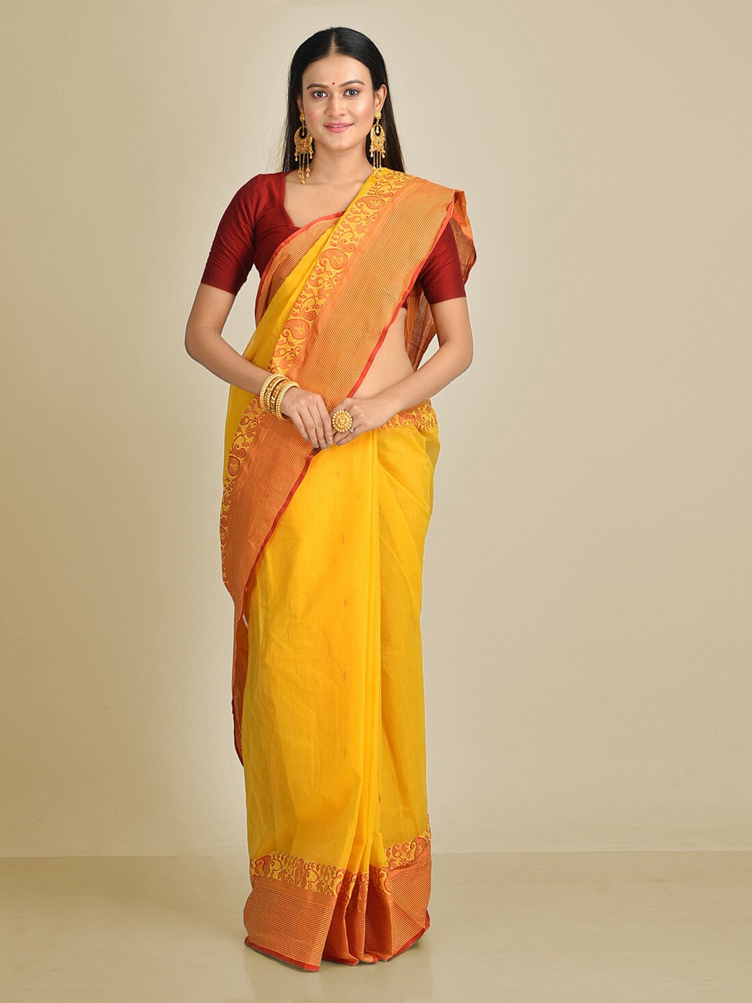 

Mitera Yellow Pure Cotton Solid Taant Saree