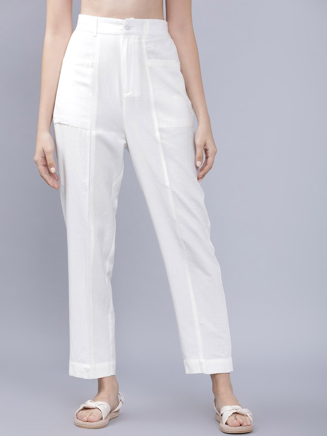 

Tokyo Talkies Women White Solid Regular Trousers