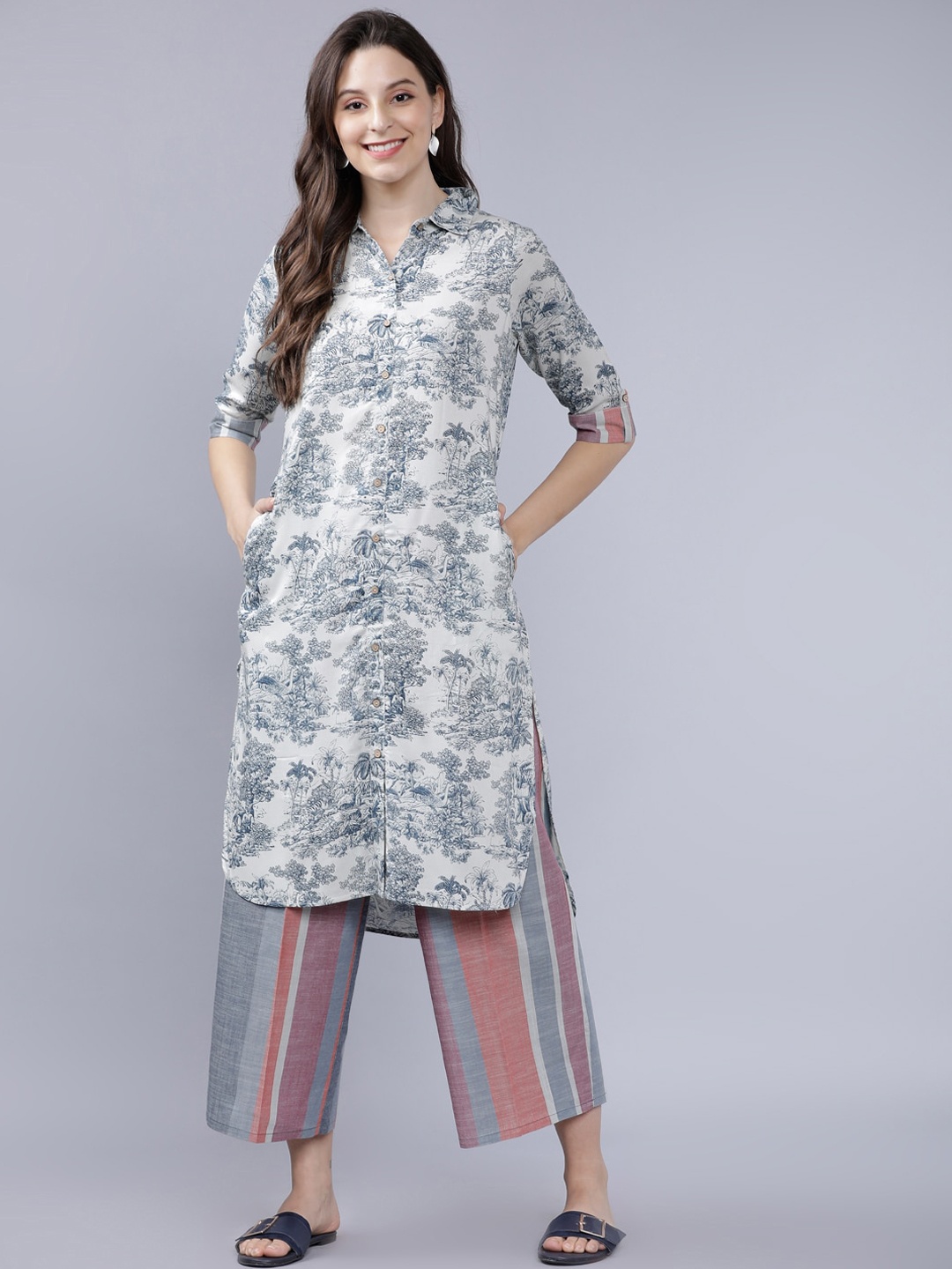 

Vishudh Women White Floral Printed Regular Kurta with Trousers