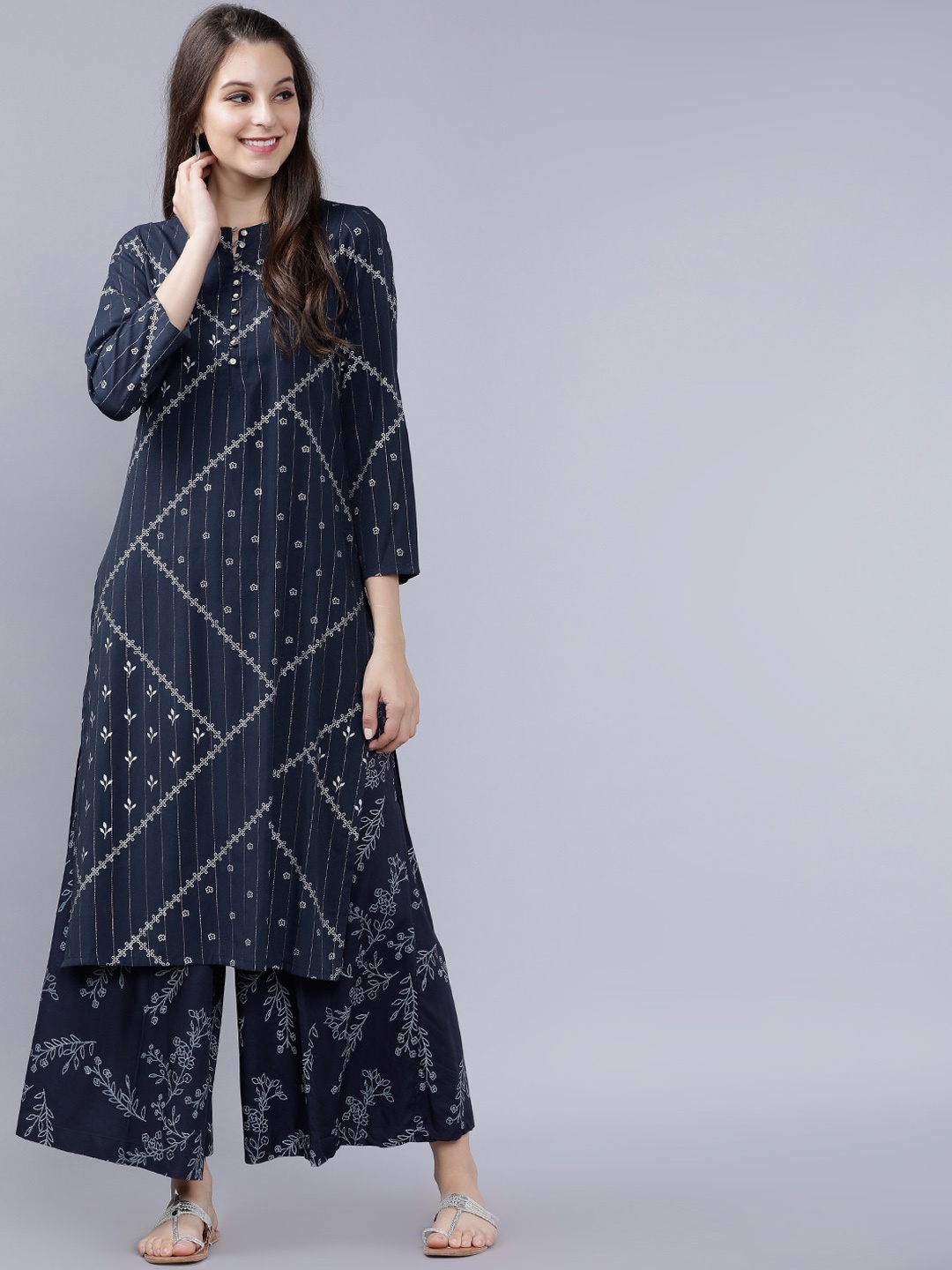 

Vishudh Women Navy Blue & Grey Solid Kurta with Palazzos