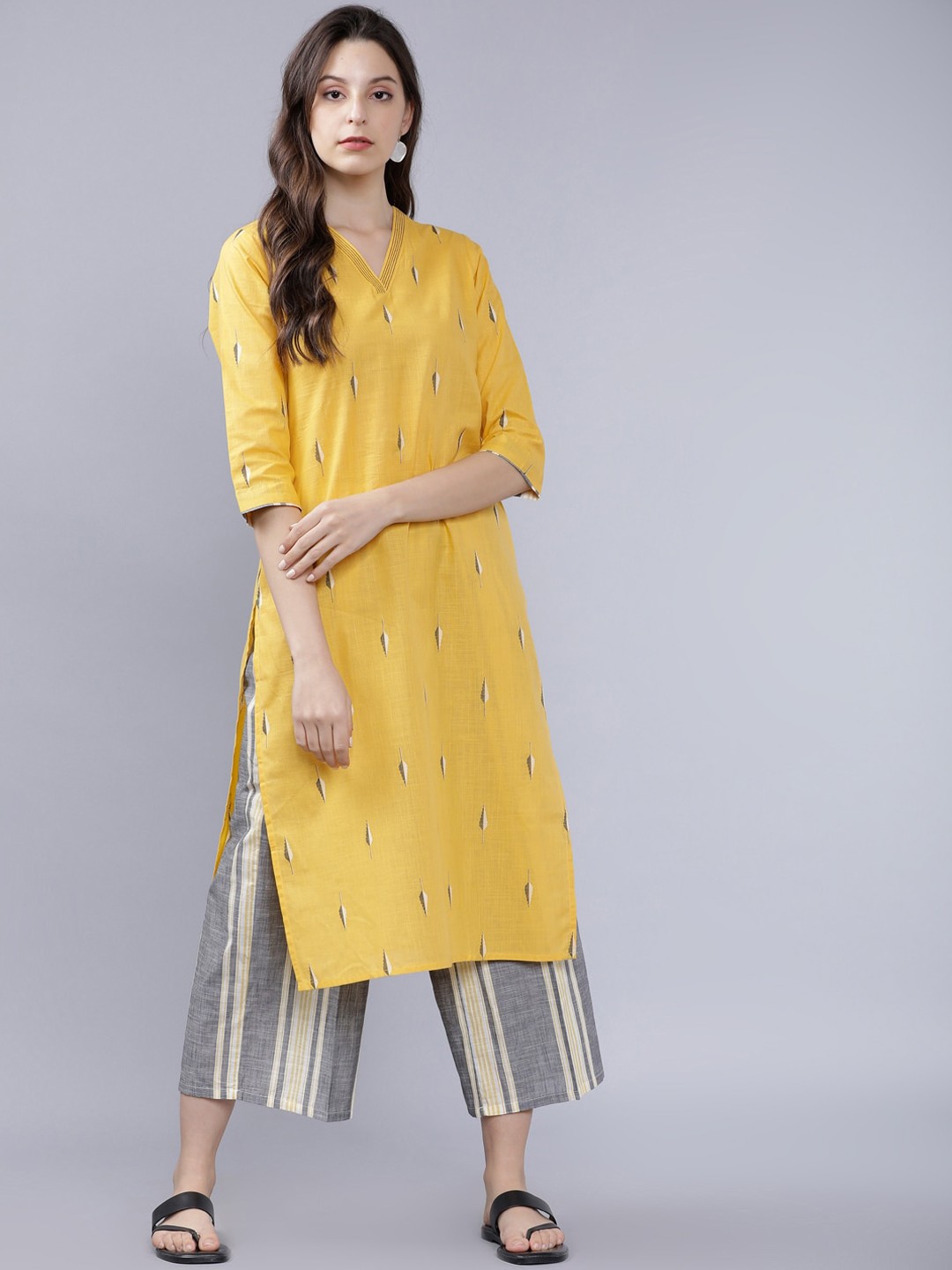 

Vishudh Women Yellow & Grey Floral Print Kurta with Palazzos