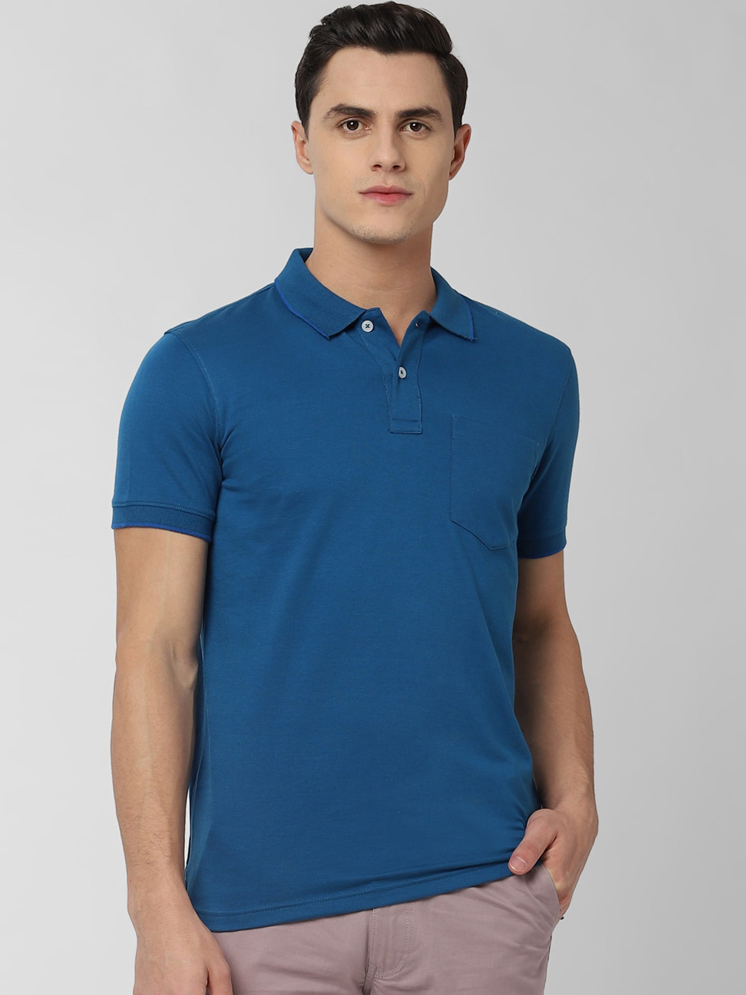 

Peter England Casuals Men Blue Solid Polo Collar Pure Cotton T-shirt