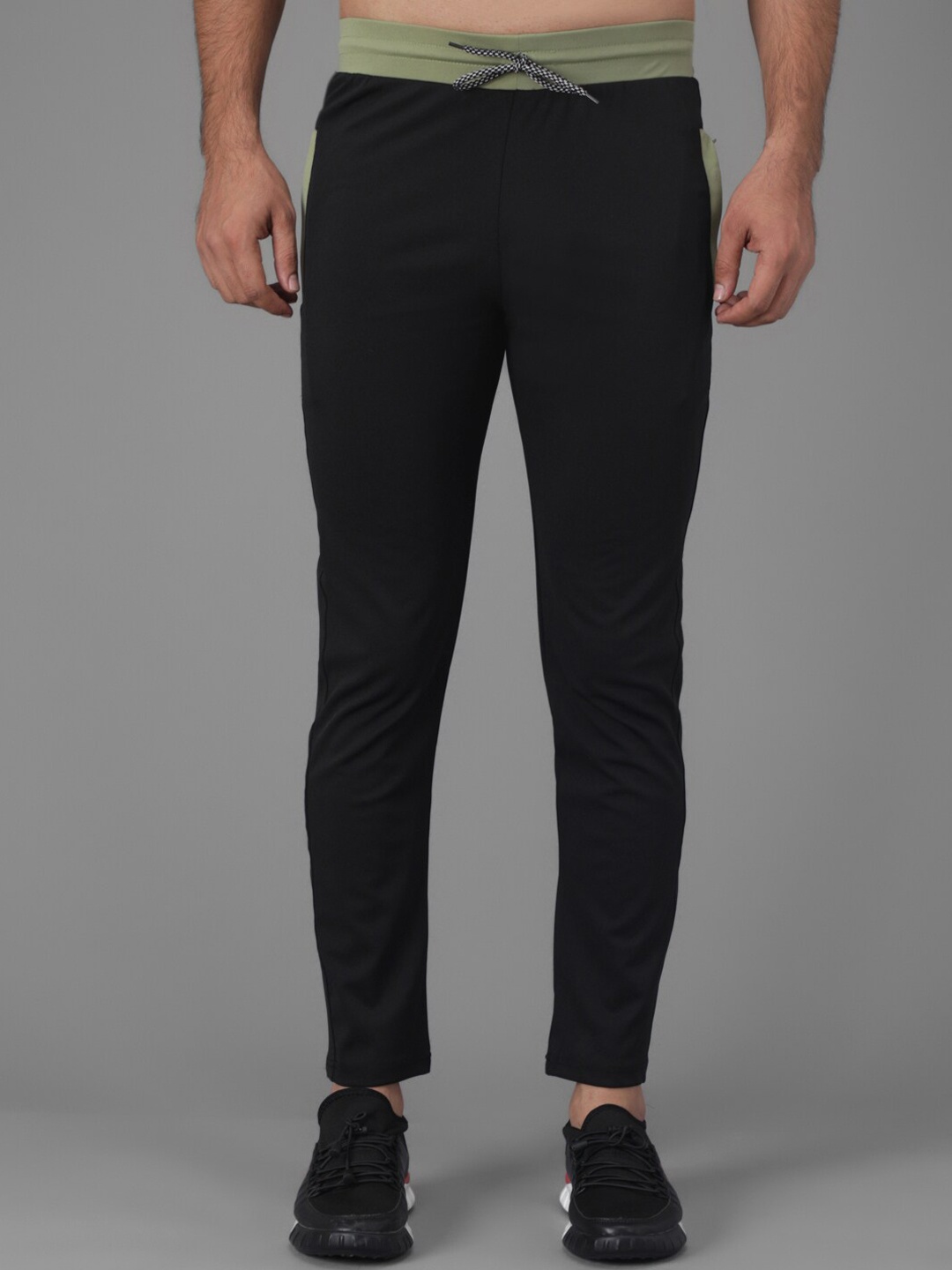 

Kotty Men Black Solid Straight-Fit Track Pants