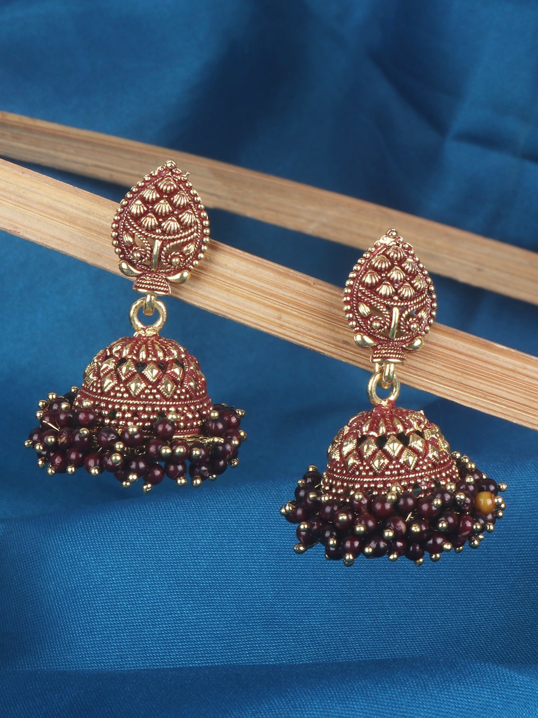 ANIKAS CREATION Maroon & Gold-Toned Dome Shaped Jhumkas