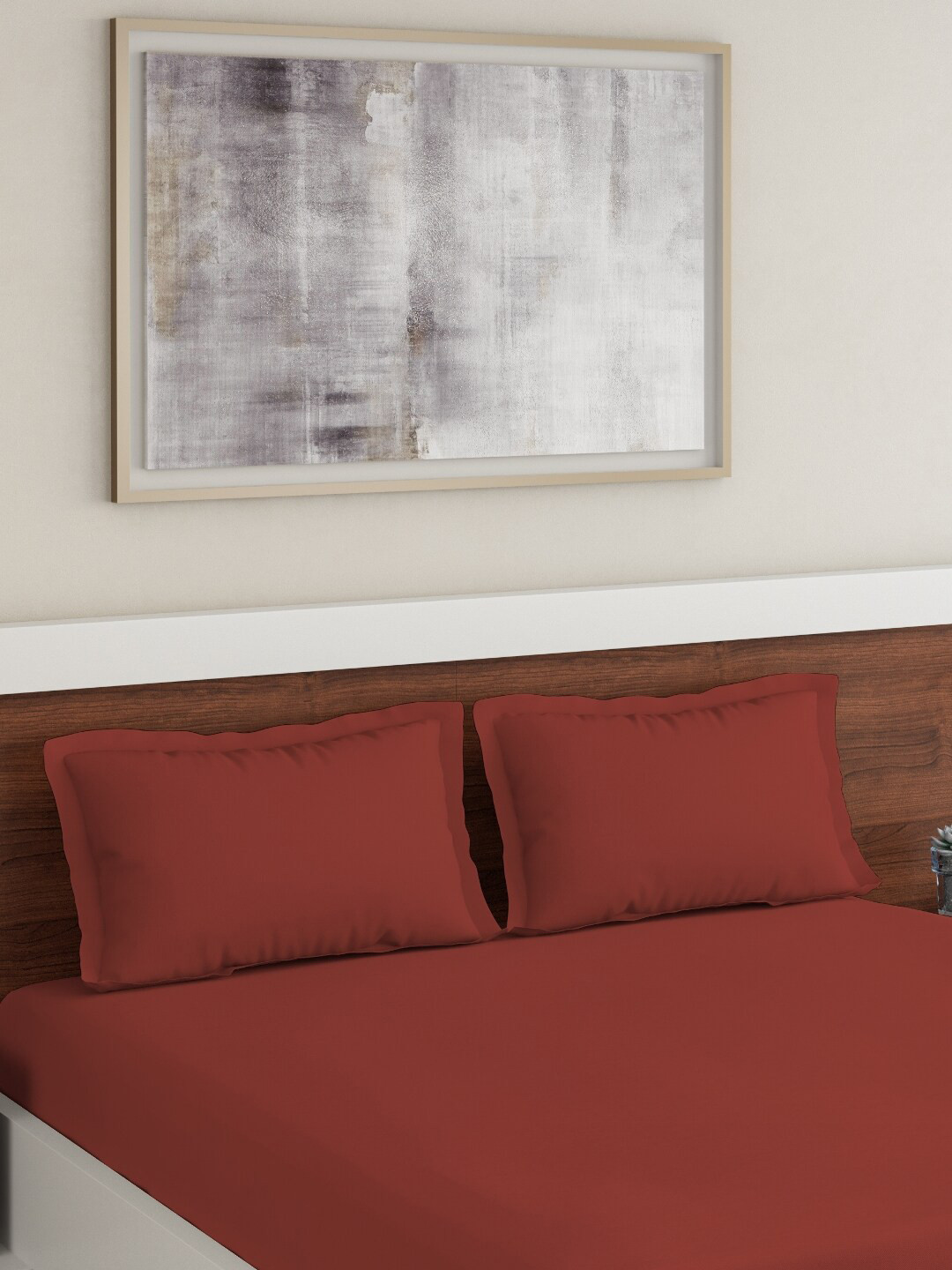 

DDecor Maroon Solid 144 TC Cotton 1 King Bedsheet with 2 Pillow Covers