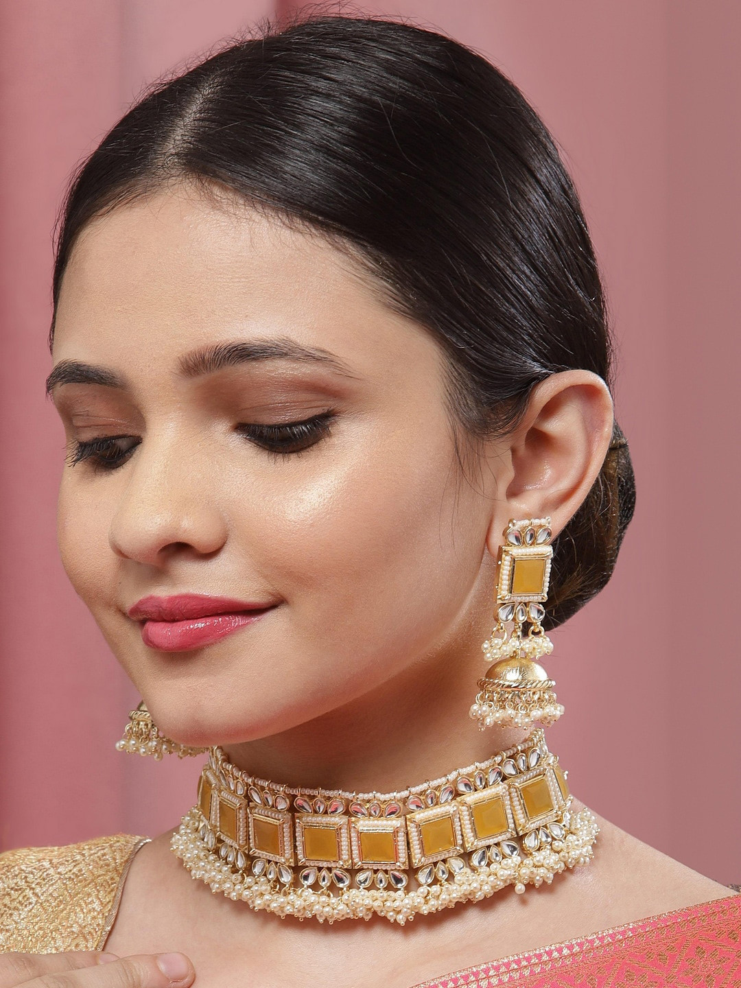 

Melani Borsa Gold-Plated & Yellow Kundan Studded Handcrafted Choker Jewellery Set