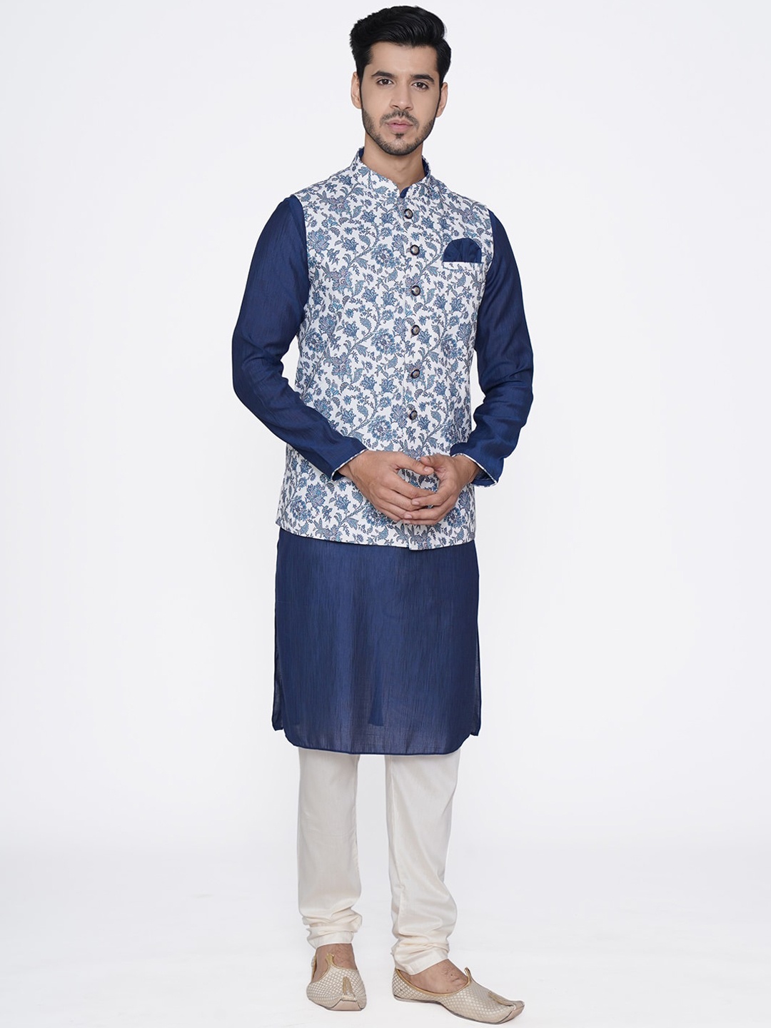 

Manyavar Men Blue Solid Kurta & Churidar with White Nehru Jacket