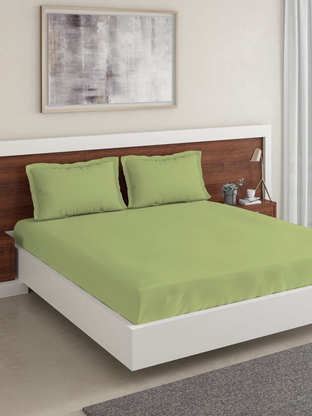

DDecor Green Solid 144 TC Cotton 1 King Bedsheet with 2 Pillow Covers