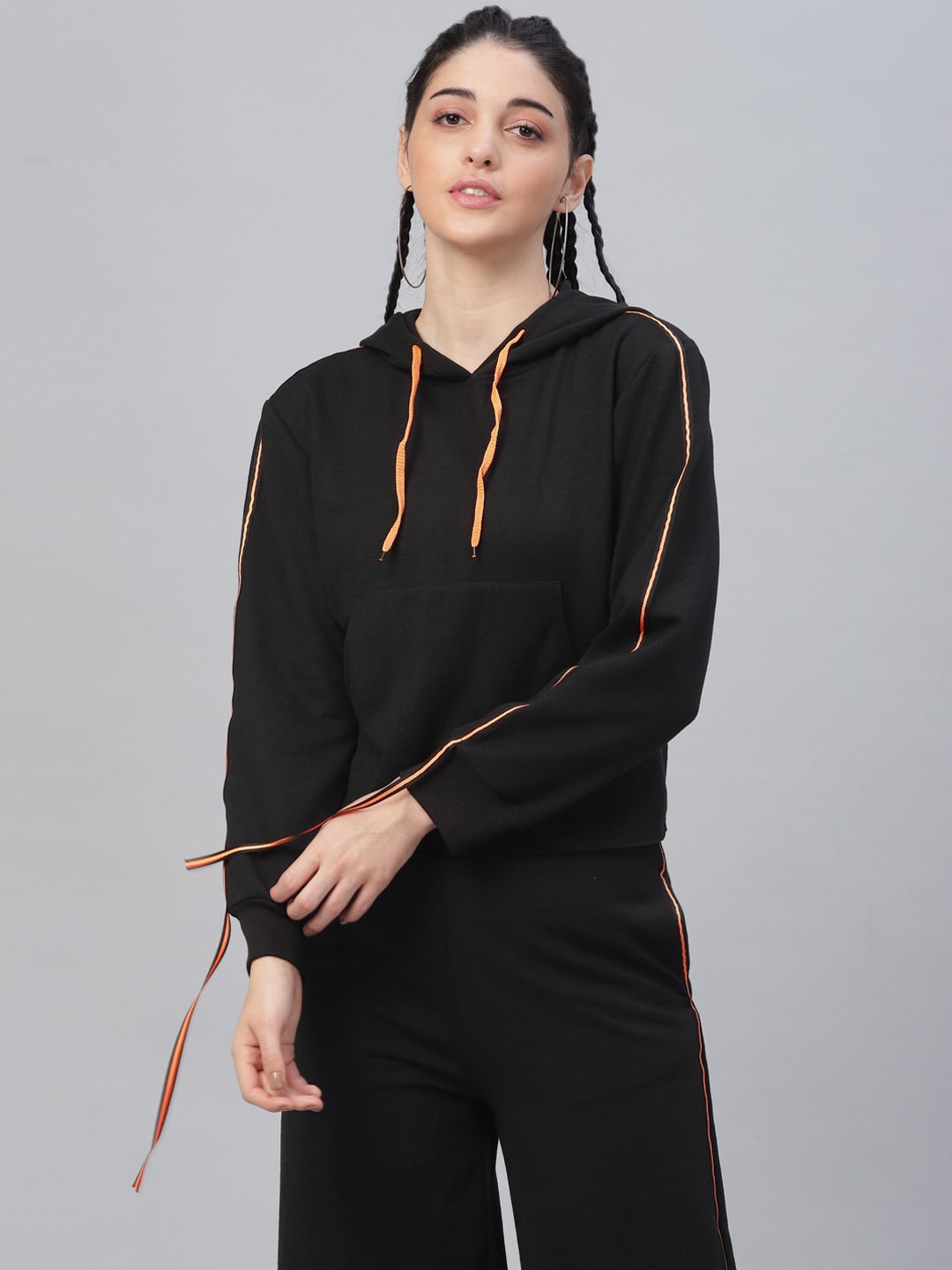 

Athena Women Black Solid Hooded Sweatshirt