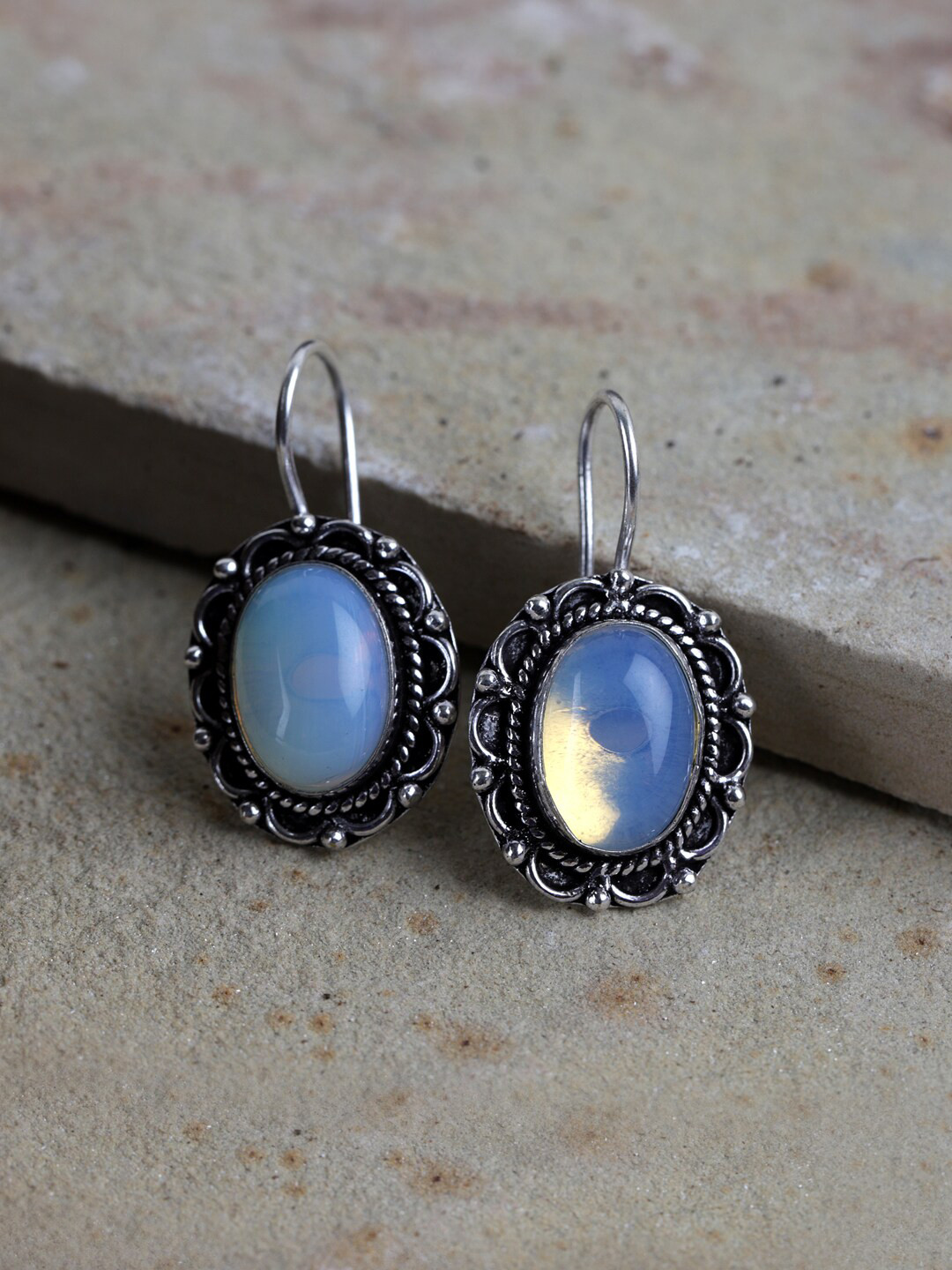

Fabstreet Silver-Plated Chalcedony Oval Shaped Drop Earrings