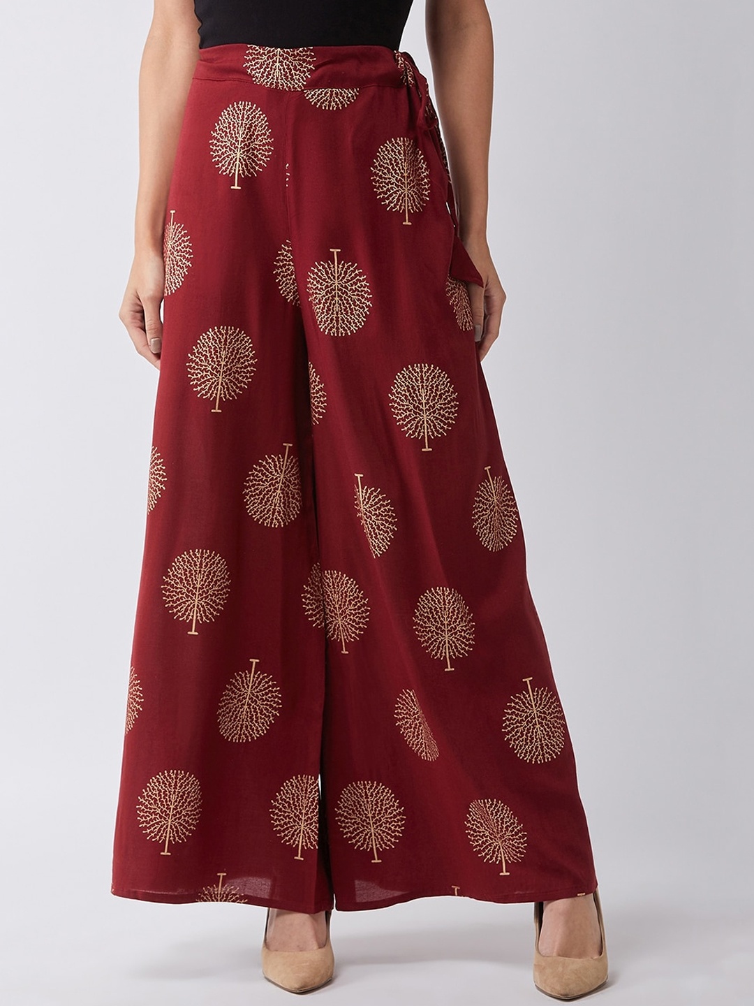 

InWeave Women Maroon & Gold Printed Flared Palazzos