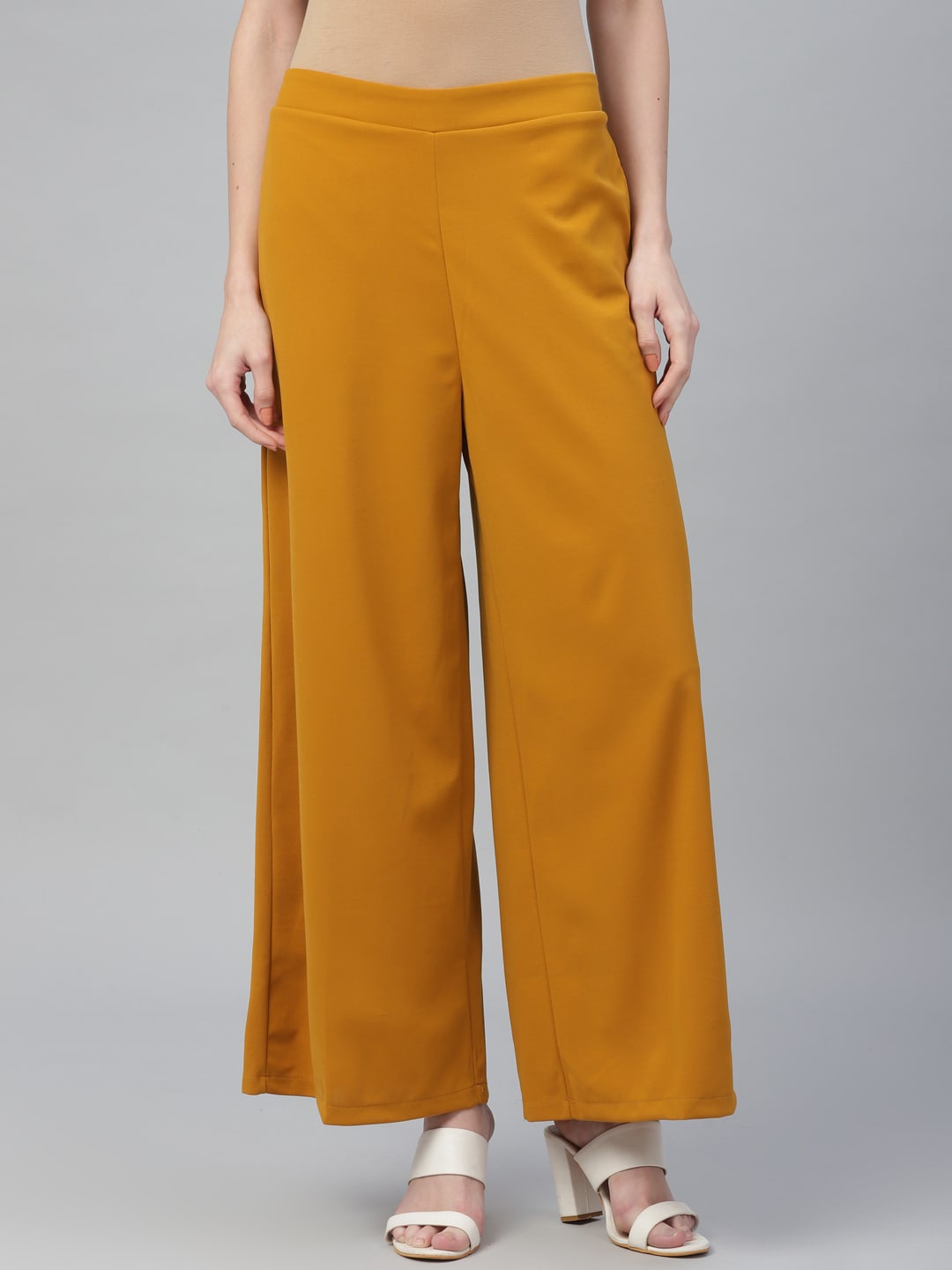

Athena Women Mustard Yellow Flared Solid Parallel Trousers