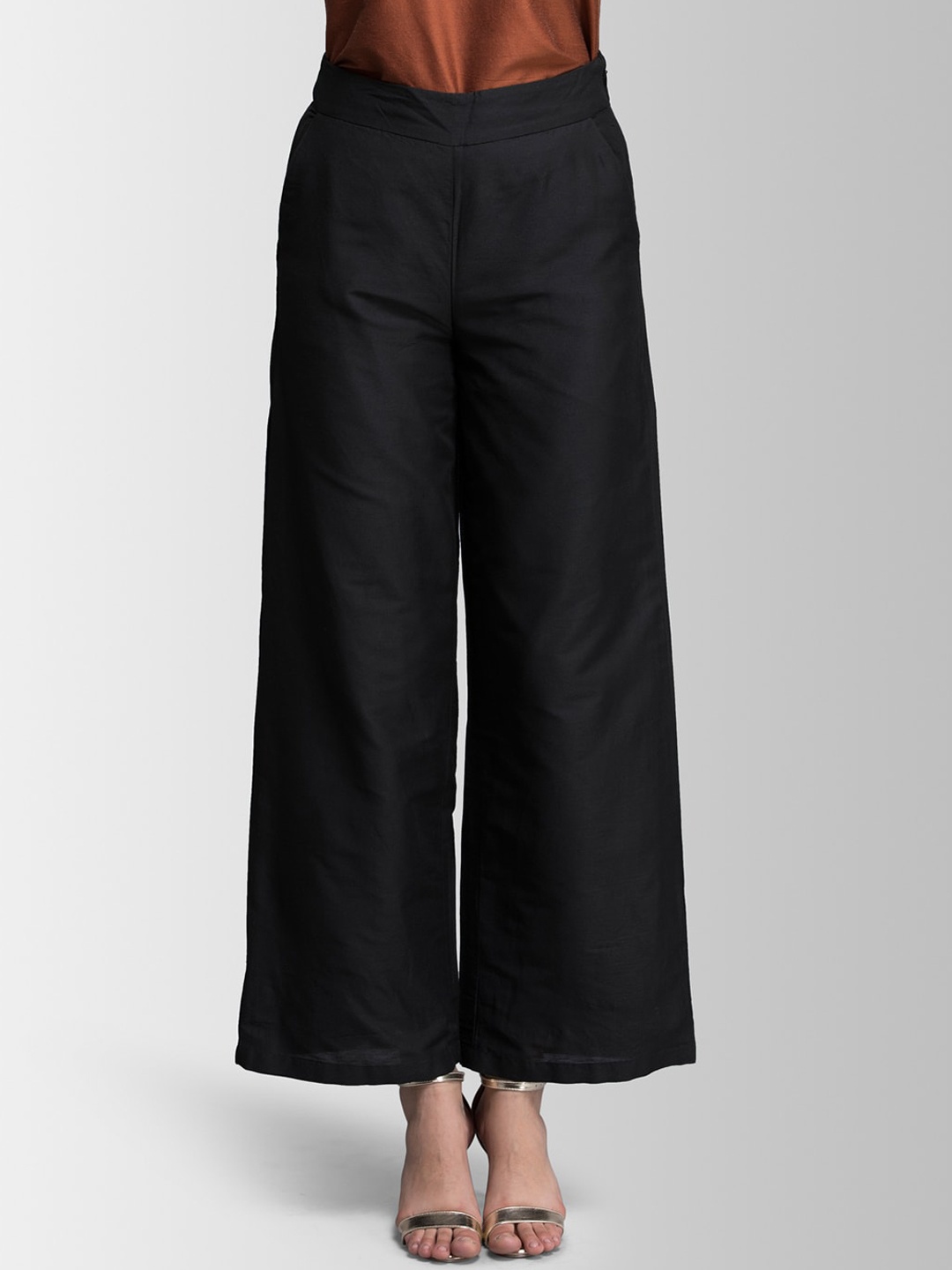 

FableStreet Women Black Flared Solid Parallel Trousers