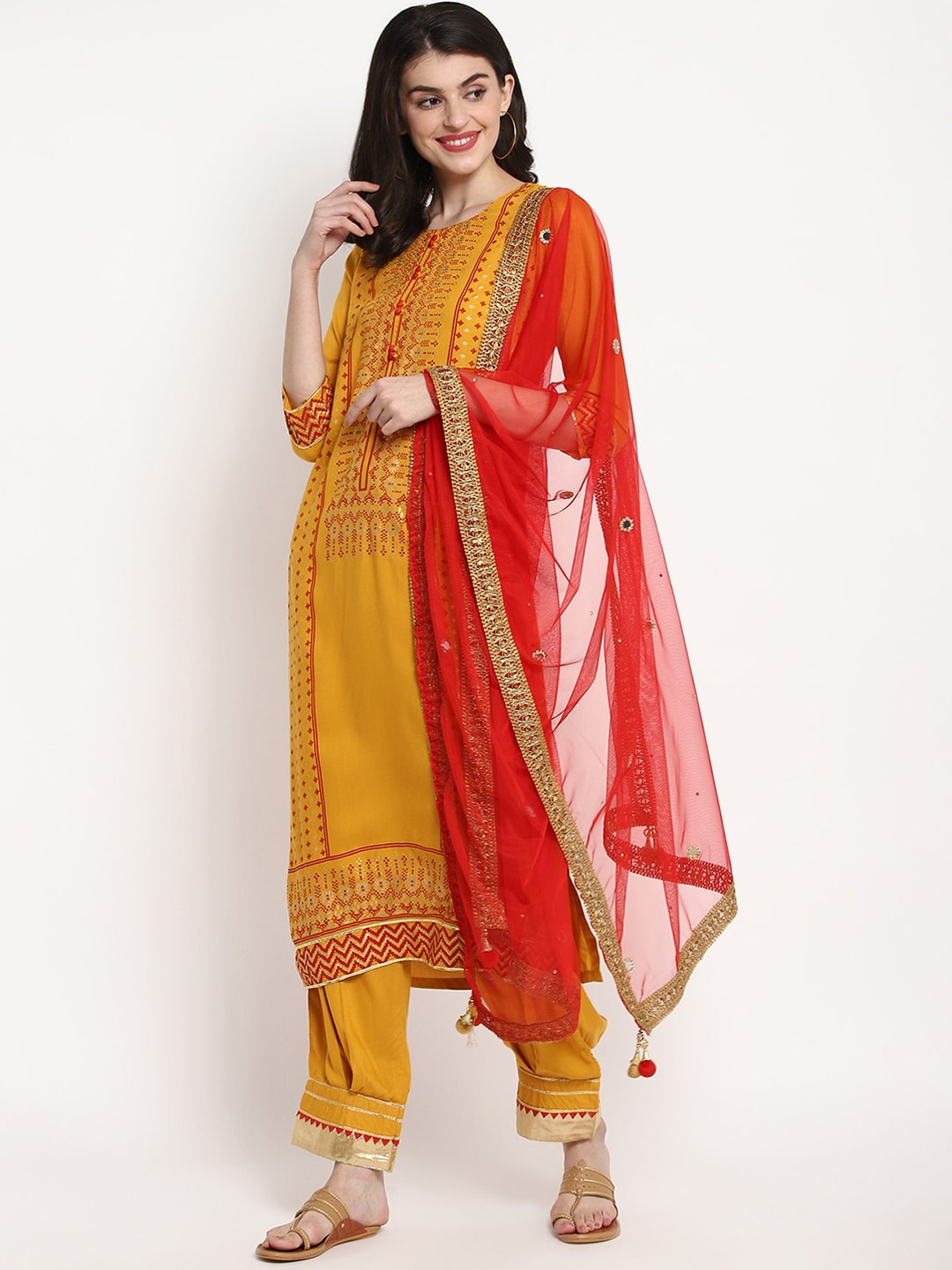 

Tulsattva Women Mustard Yellow & Red Printed Kurta with Trousers & Dupatta