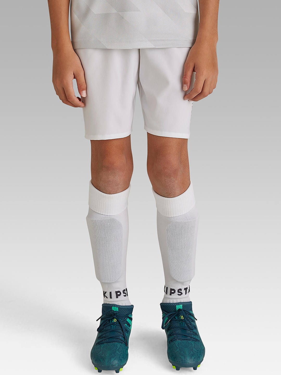 

Kipsta By Decathlon Boys White Solid Regular Fit Football Shorts