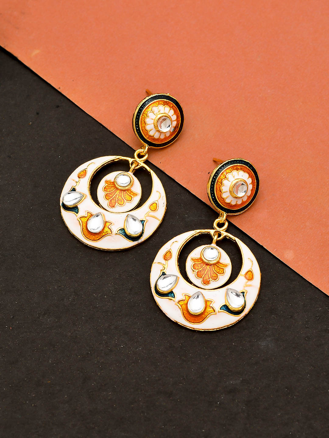 

Silvermerc Designs Gold Plated Handcrafted White Circular Drop Earrings