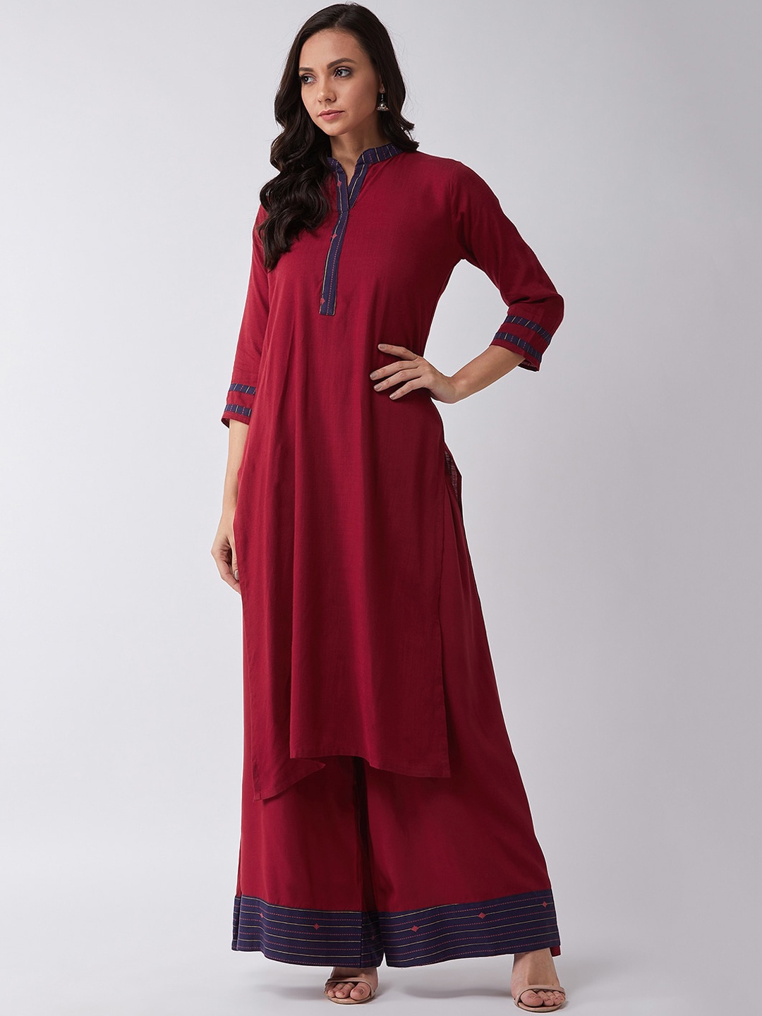 

InWeave Women Maroon & Blue Solid Straight Kurta
