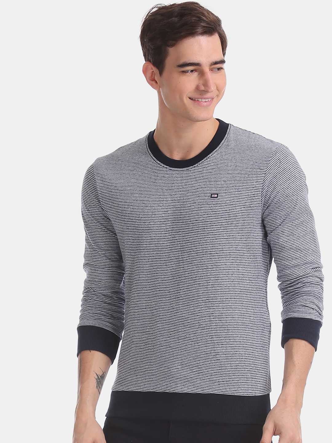 

Arrow Sport Men Blue & Off-White Striped Sweatshirt