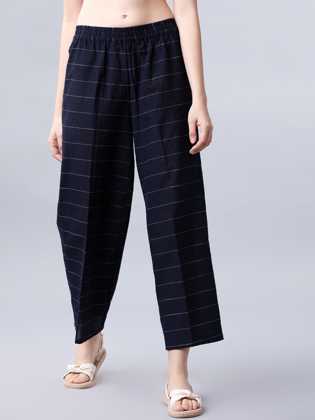 

Vishudh Women Navy Blue & Off-White Solid Straight Palazzos