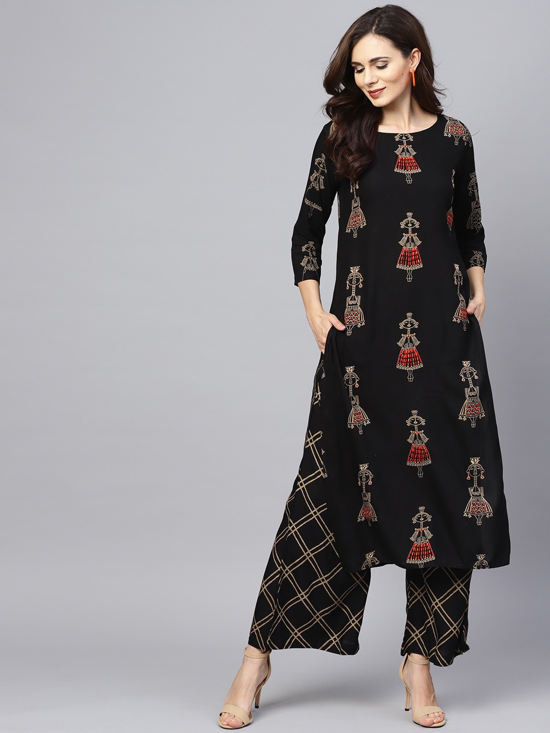 

Ishin Women Black & Gold-Toned Printed Kurta with Palazzos