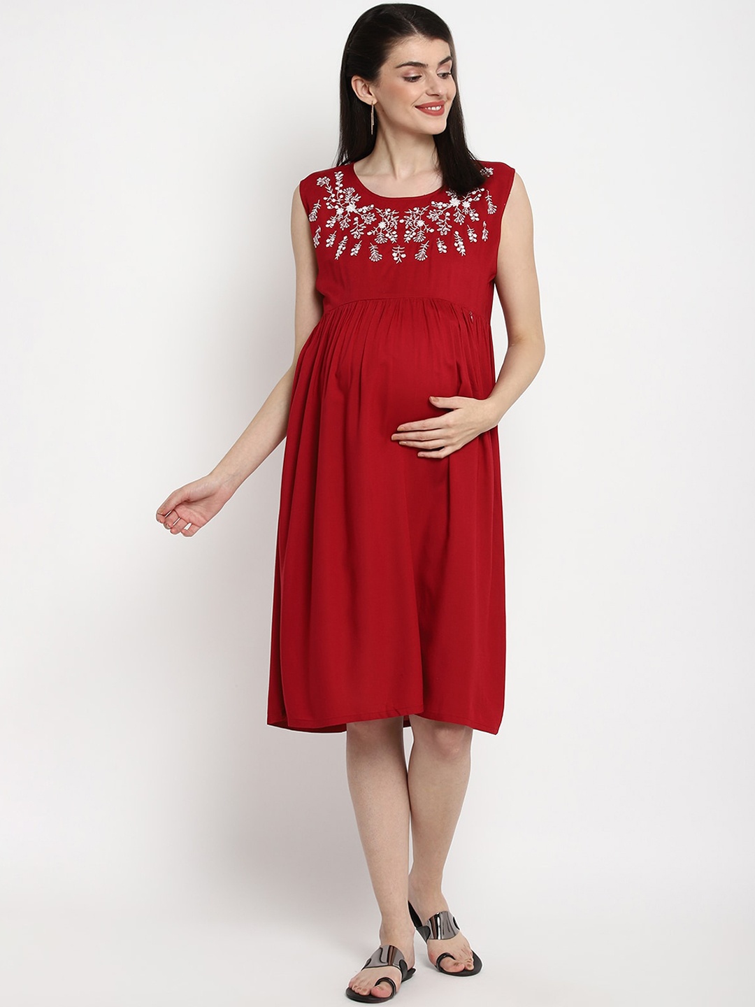 

The Vanca Women Maternity Maroon Solid Fit and Flare Dress