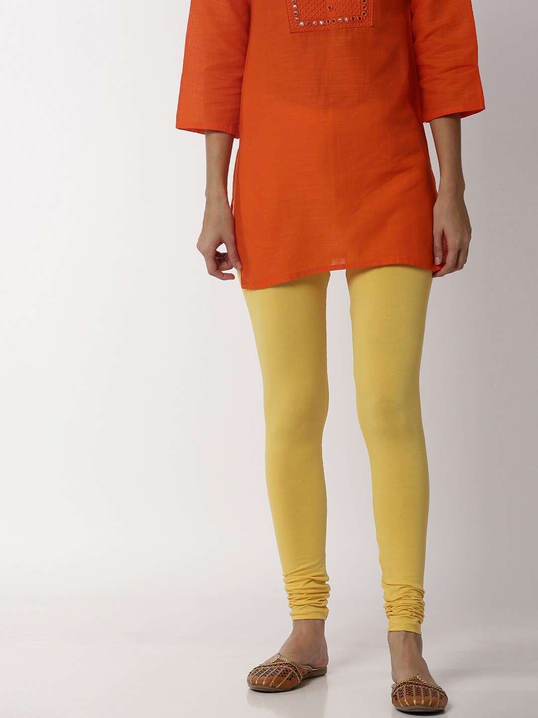 

Soch Women Yellow Solid Mid-Rise Churidar