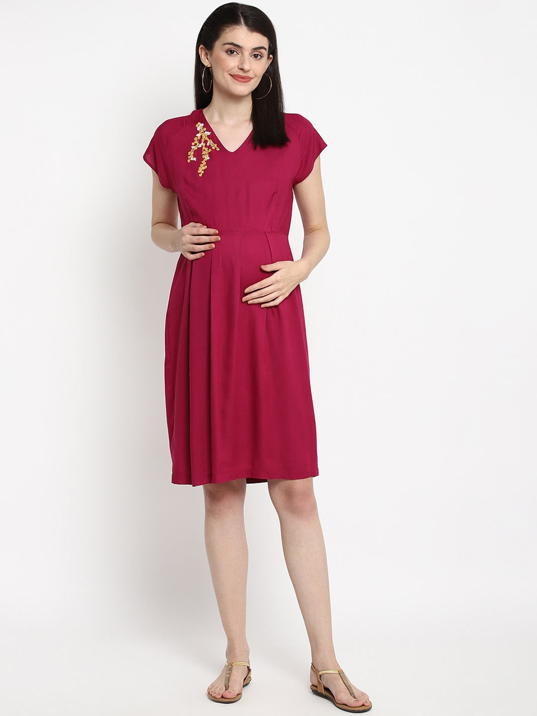 

The Vanca Women Maternity Red Solid Fit and Flare Dress