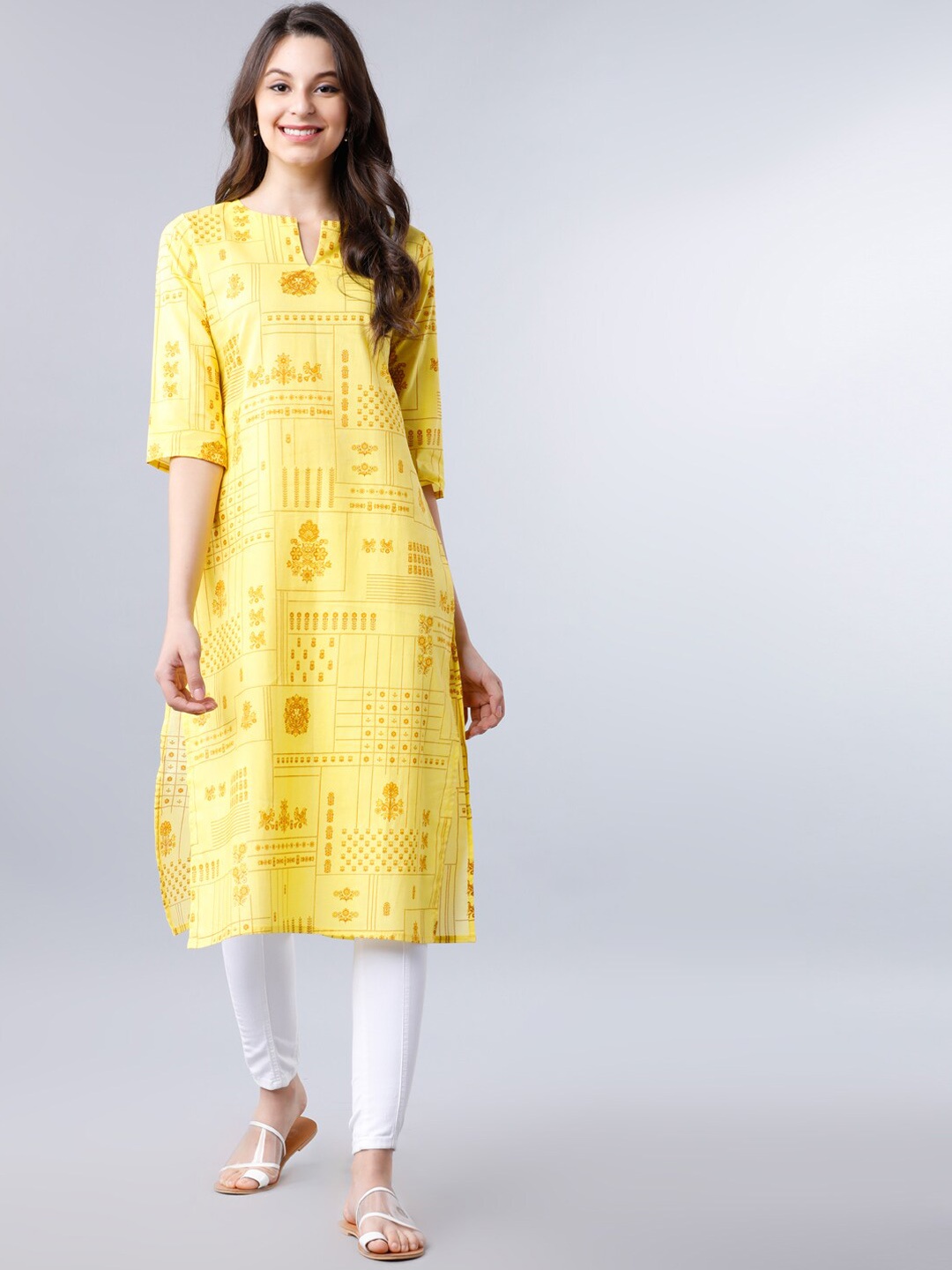 

Vishudh Women Yellow Printed Straight Cotton Kurta