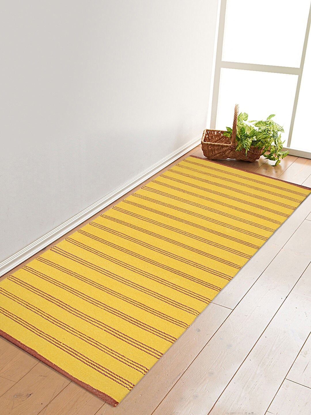 

Saral Home Yellow & Maroon Striped Cotton Floor Rug