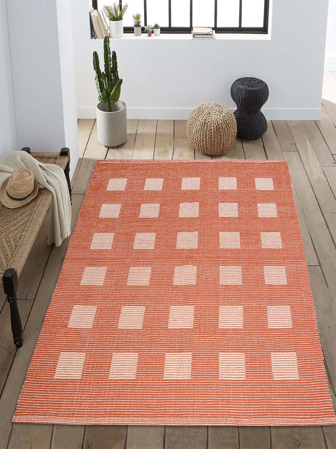 

Saral Home Orange Geometric Textured Dhurrie