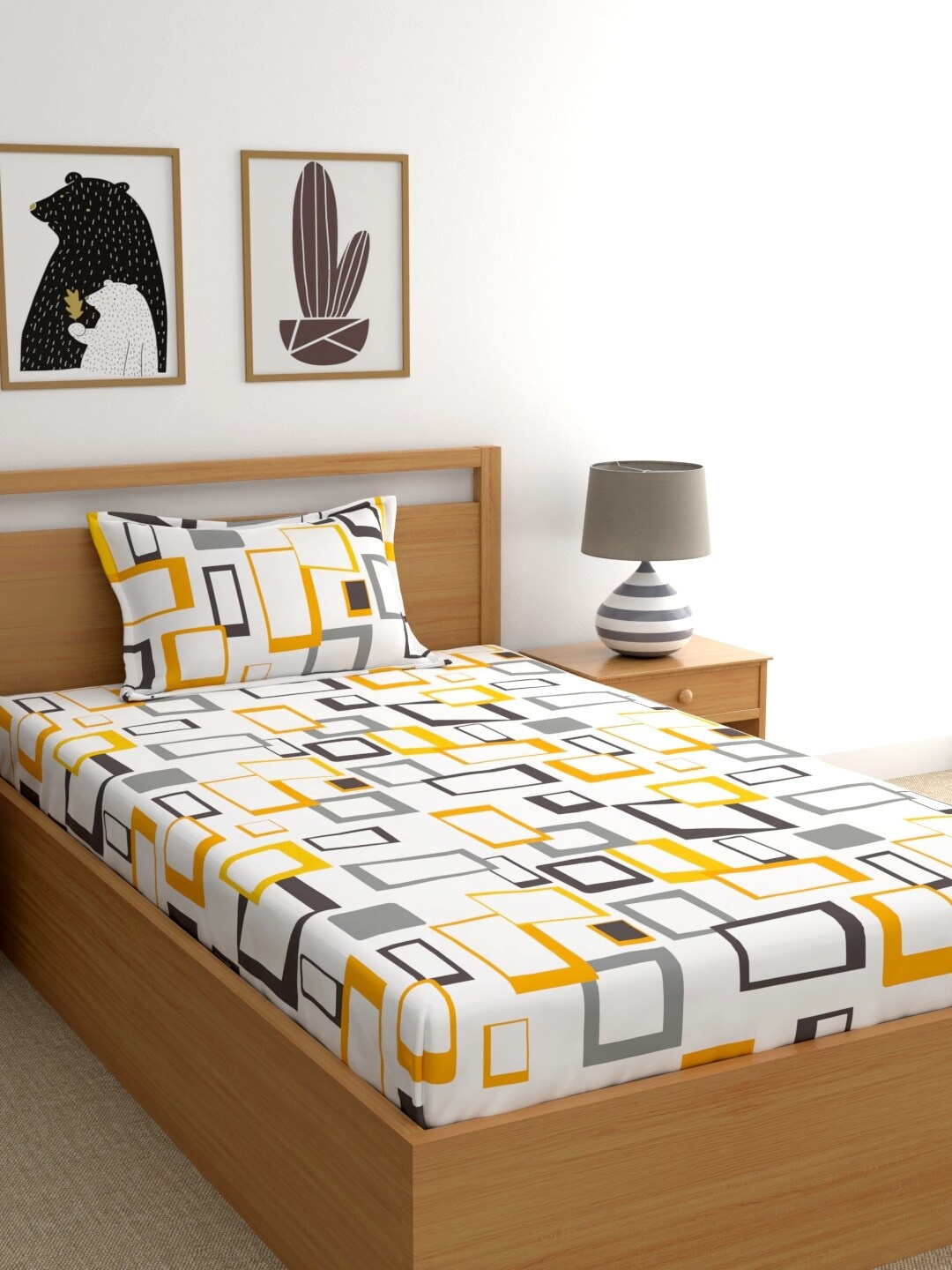 

Home Ecstasy Yellow & White Geometric 140 TC Cotton 1 Single Bedsheet with 1 Pillow Covers