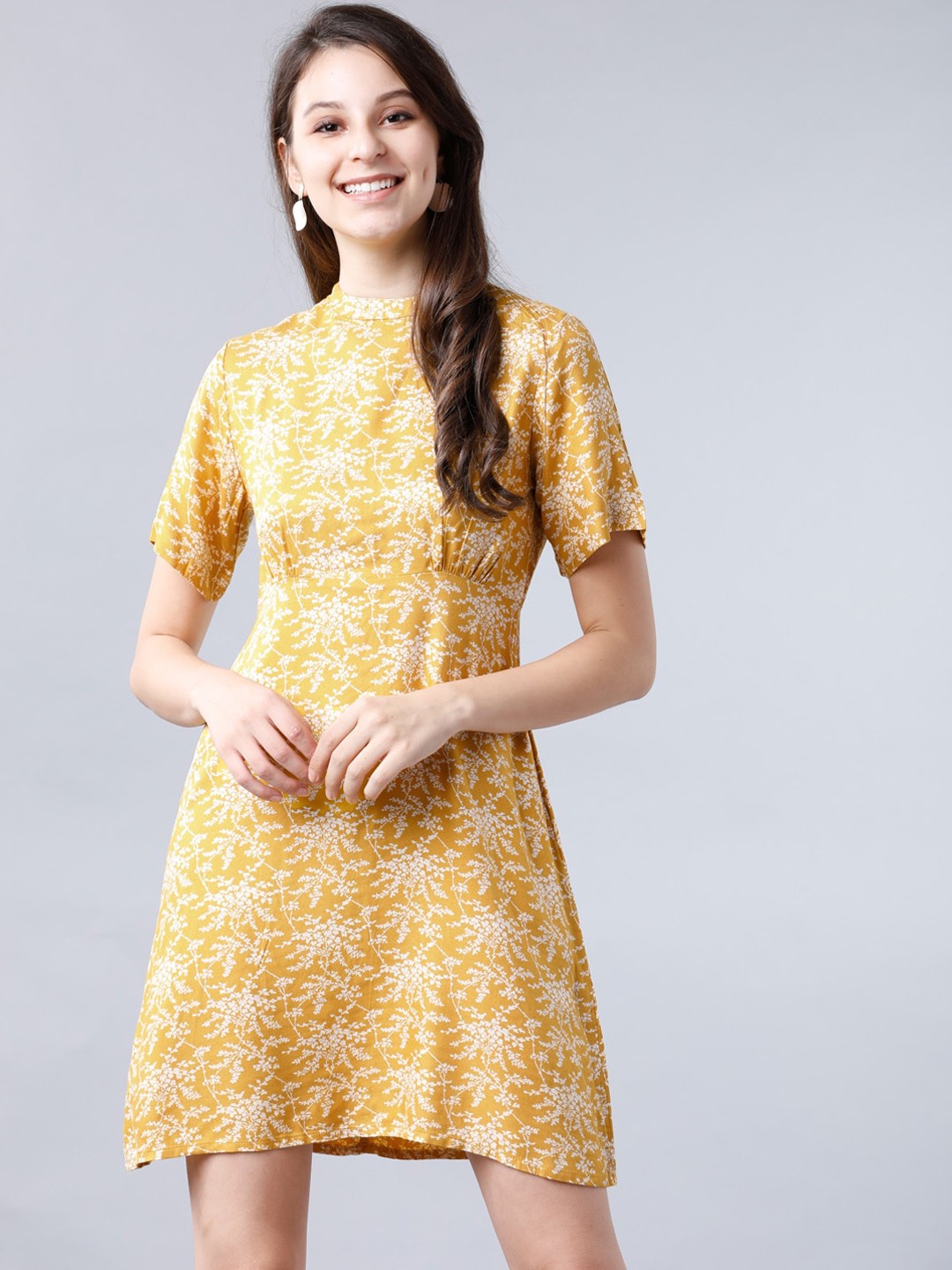 

Tokyo Talkies Women Mustard Yellow Floral Printed Empire Dress