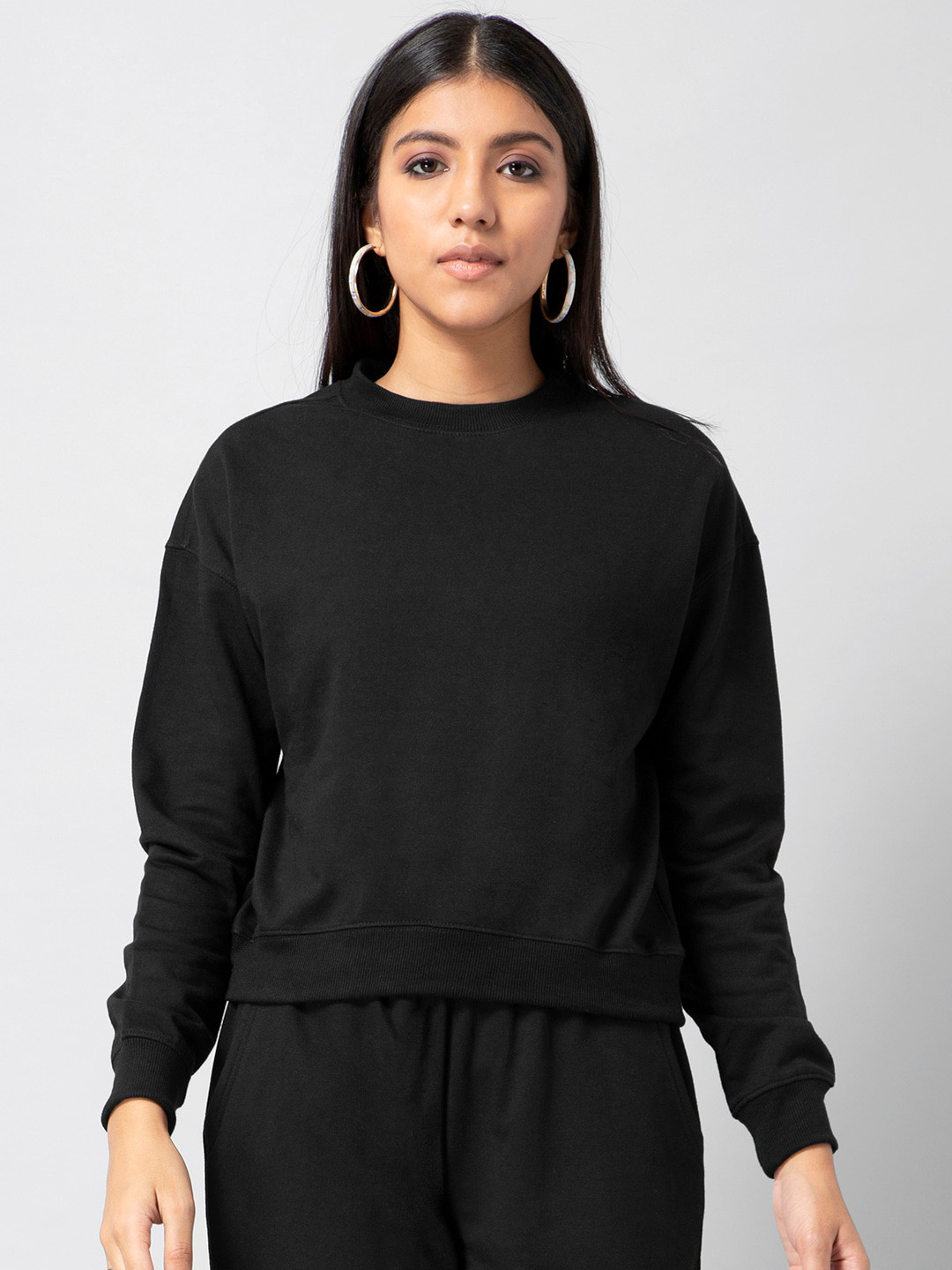 

FabAlley Women Black Solid Sweatshirt