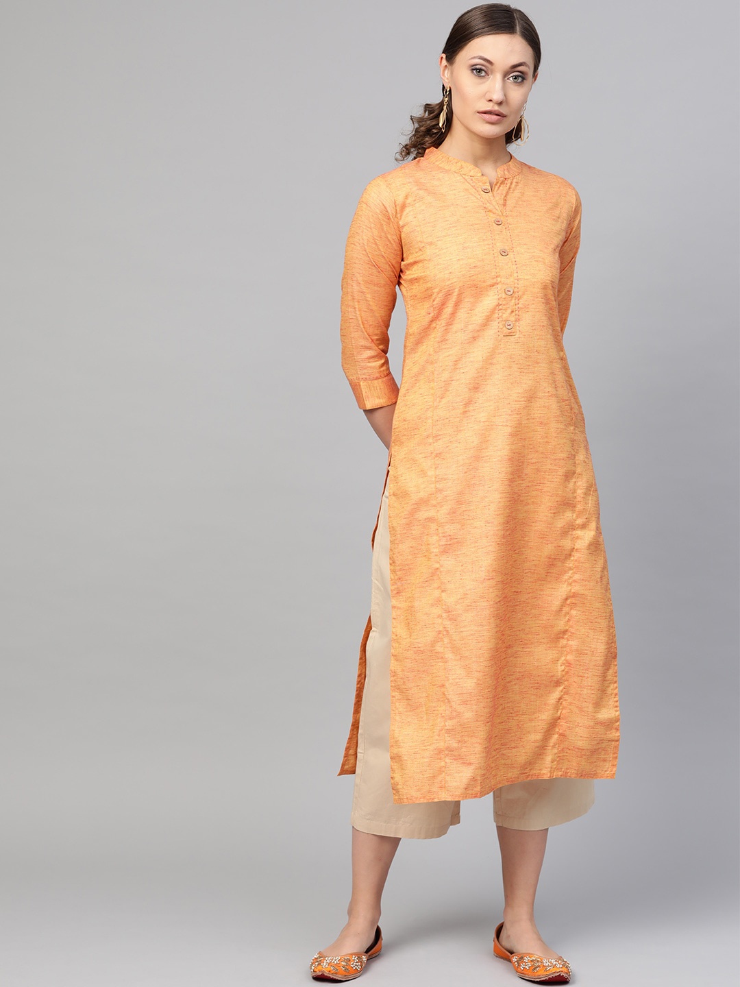 

KSUT Women Orange Solid Straight Kurta