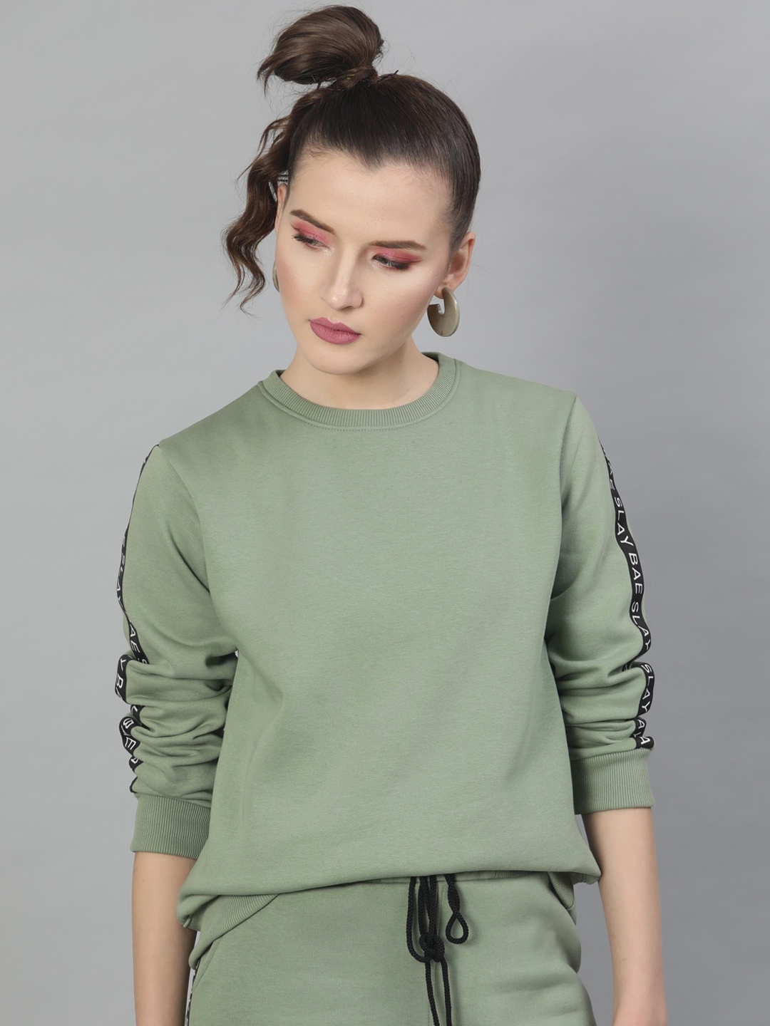 

STREET 9 Women Green Solid Sweatshirt