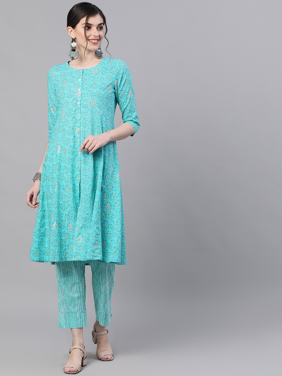 

Ishin Women Blue Printed Kurta with Trousers