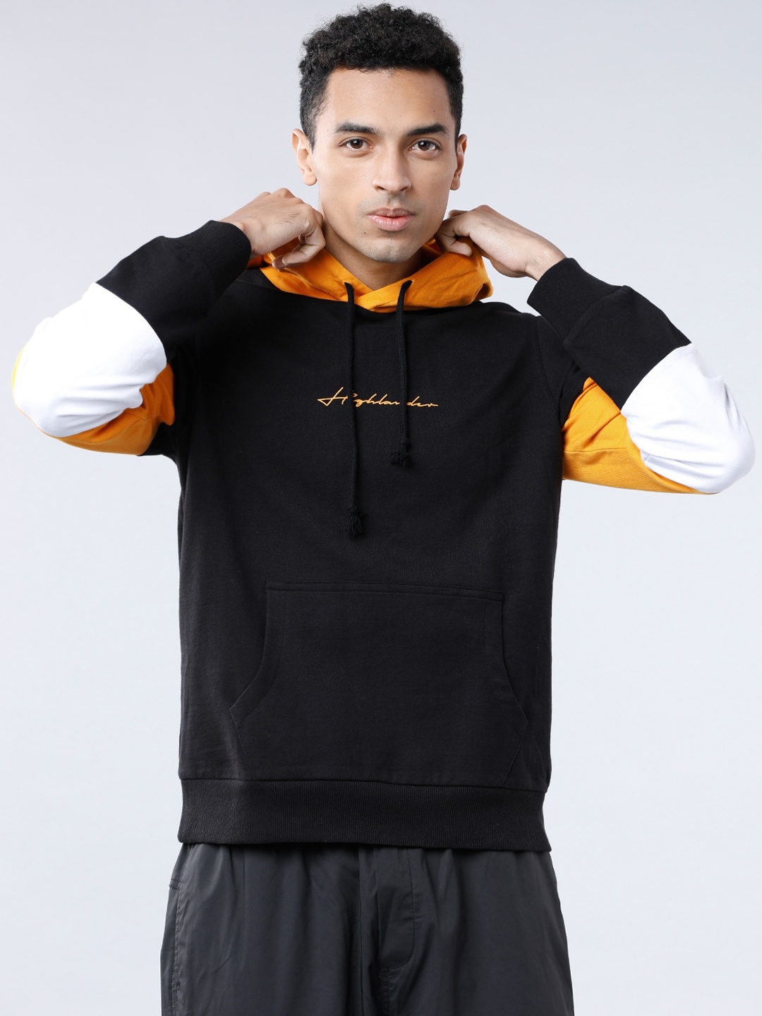

HIGHLANDER Men Black & Mustard Solid Hooded Sweatshirt
