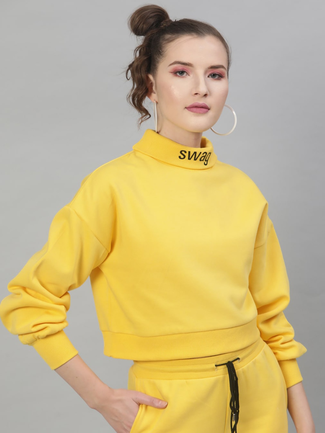 

STREET 9 Women Yellow Solid Sweatshirt