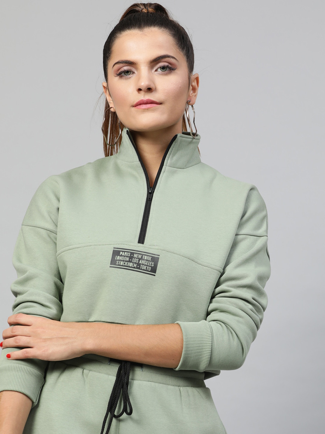 

STREET 9 Women Green Solid Sweatshirt