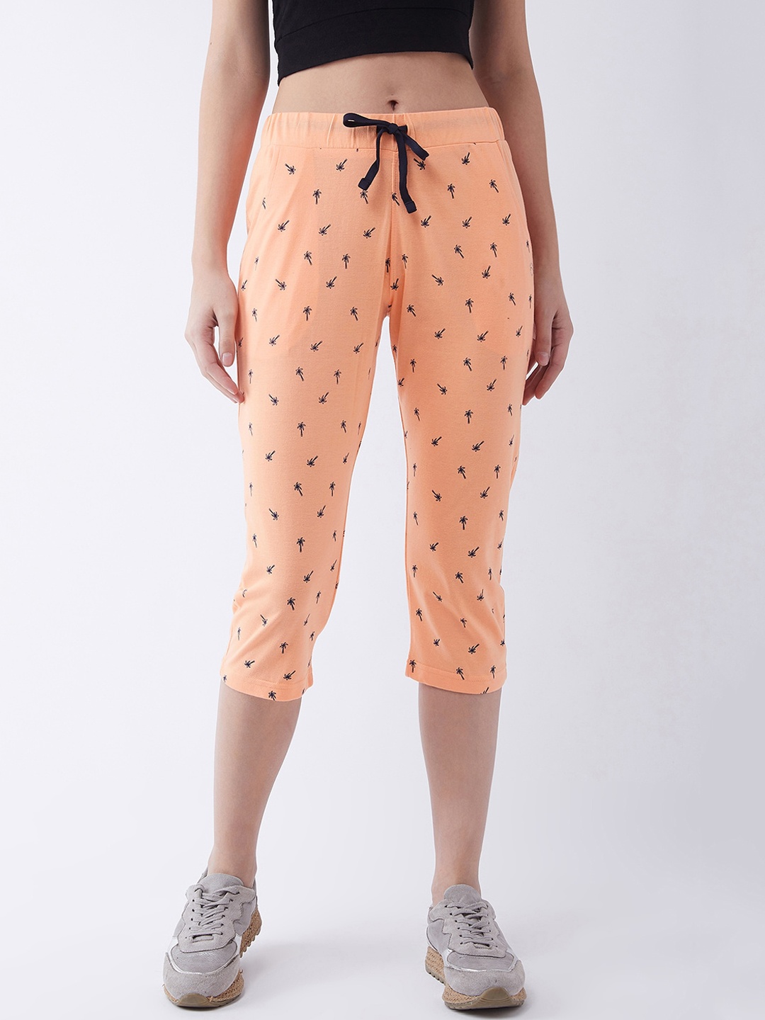 

FEMEA Women Peach-Coloured & Navy Blue Printed Slim-Fit Capris