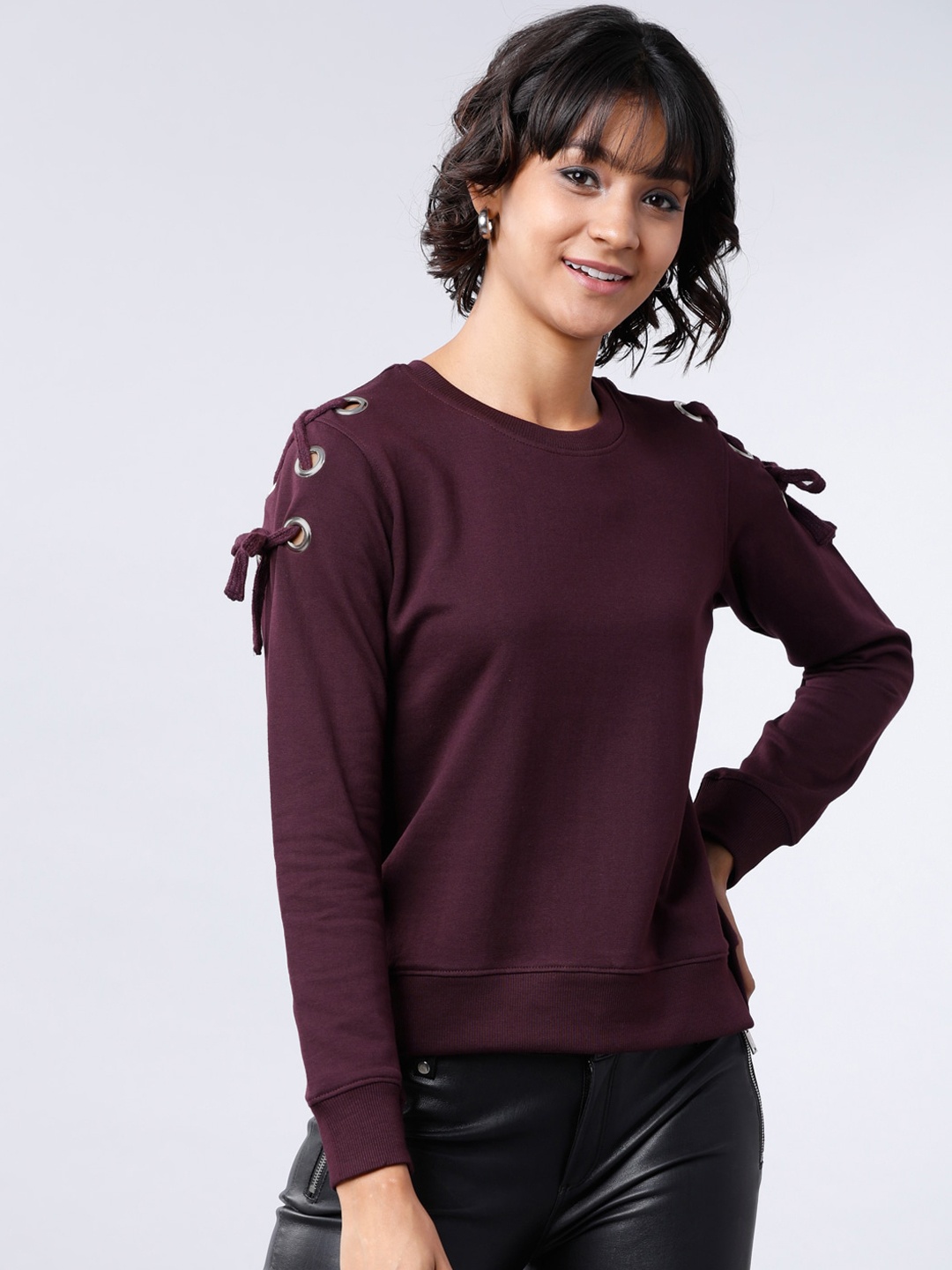 

Tokyo Talkies Women Burgundy Solid Sweatshirt