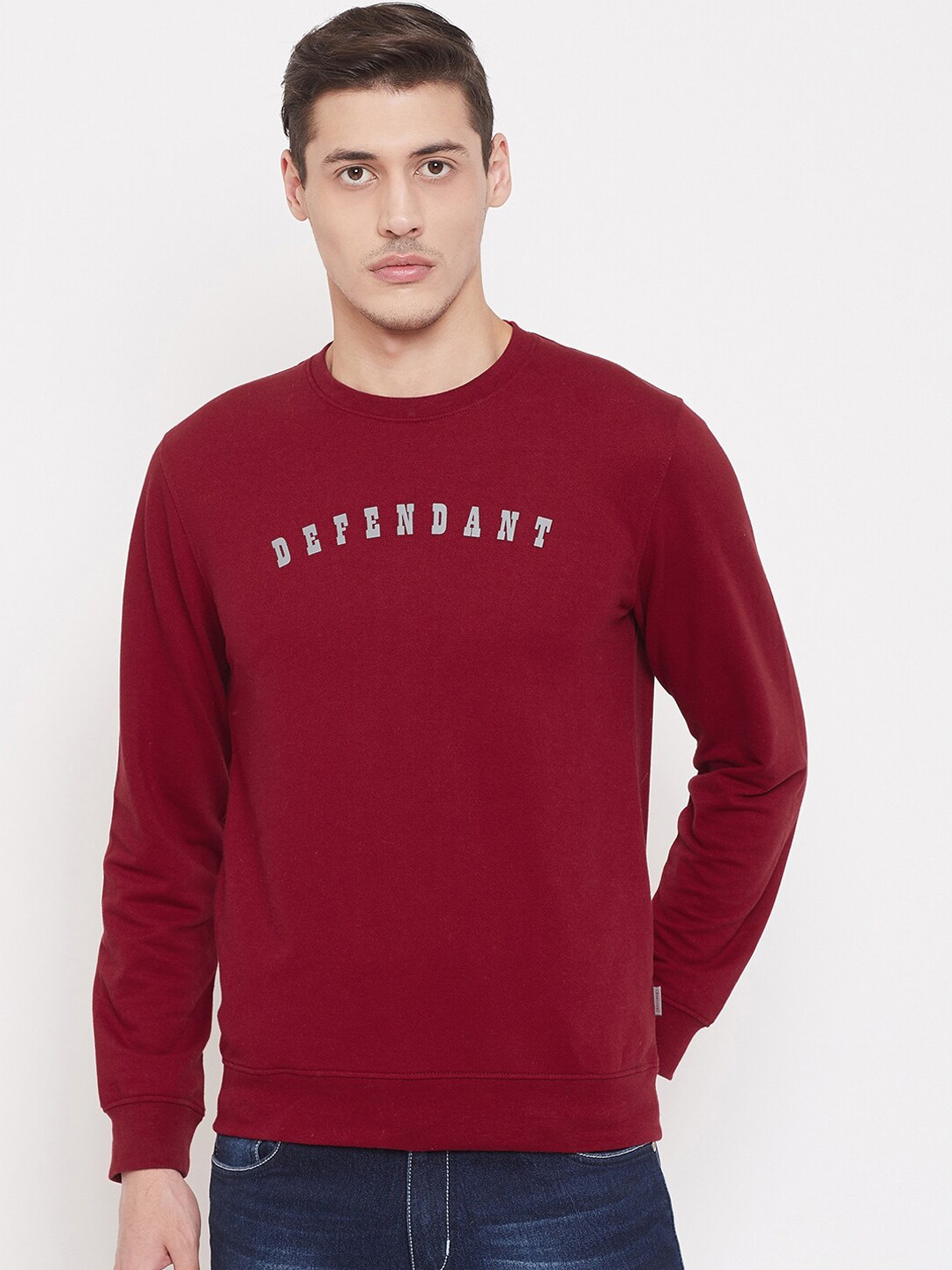 

Crimsoune Club Men Red Solid Sweatshirt