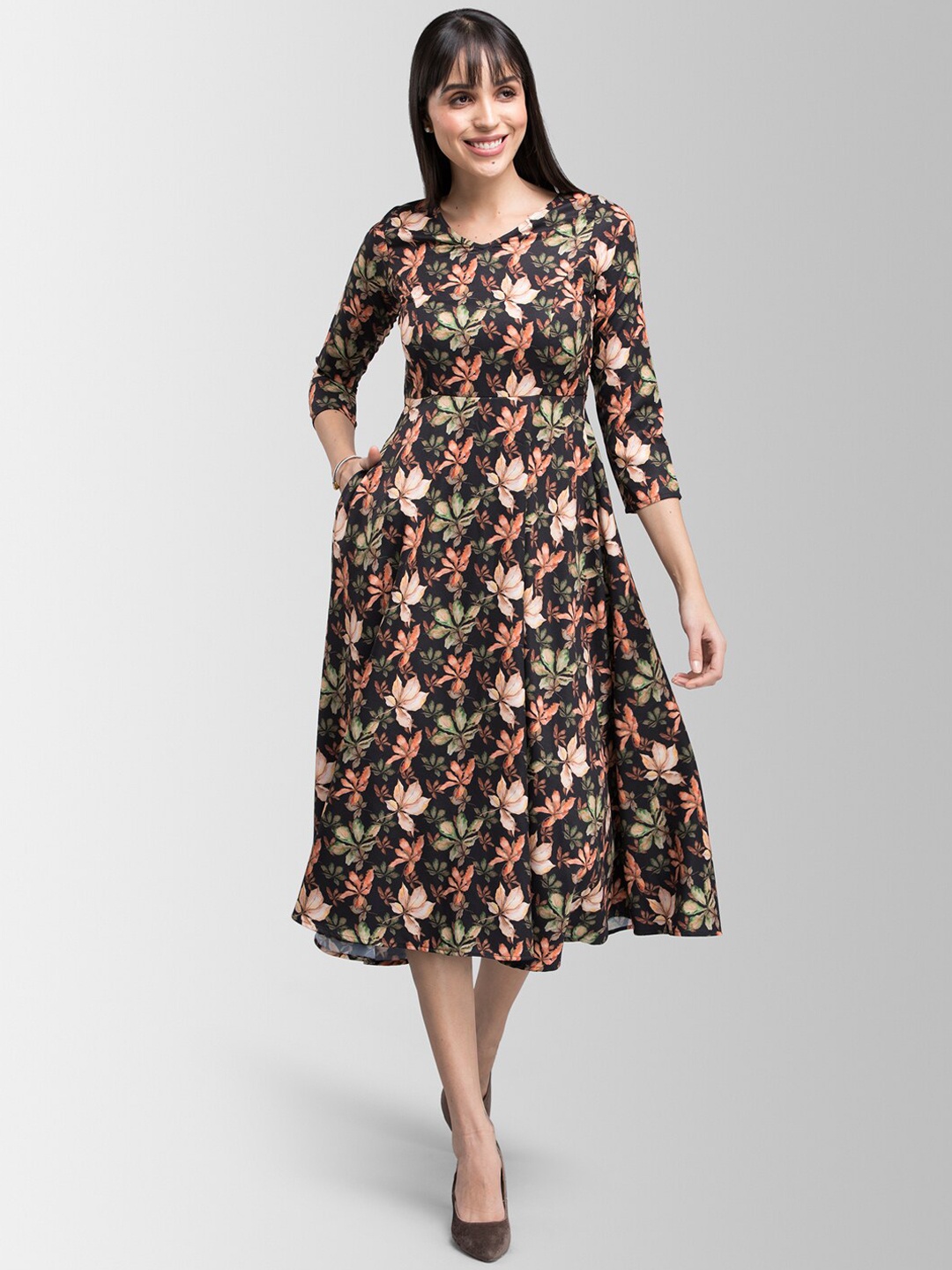 

FableStreet Women Black Printed Fit and Flare Dress