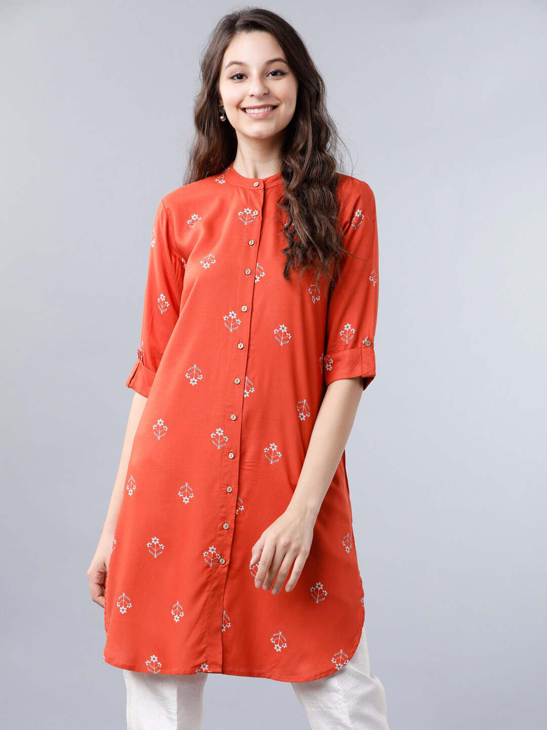 

Vishudh Women Rust Orange & White Floral Printed Tunic