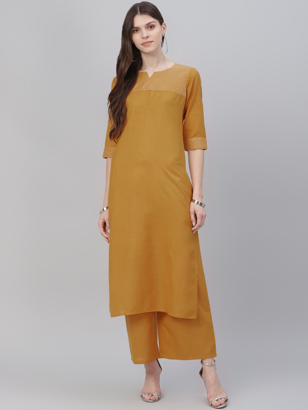 

Gerua By Libas Women Yellow Solid Kurta with Palazzos