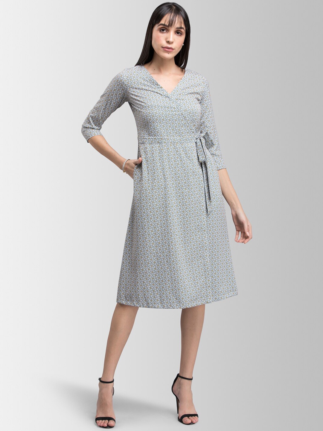 

FableStreet Women White & Black Printed Wrap Dress