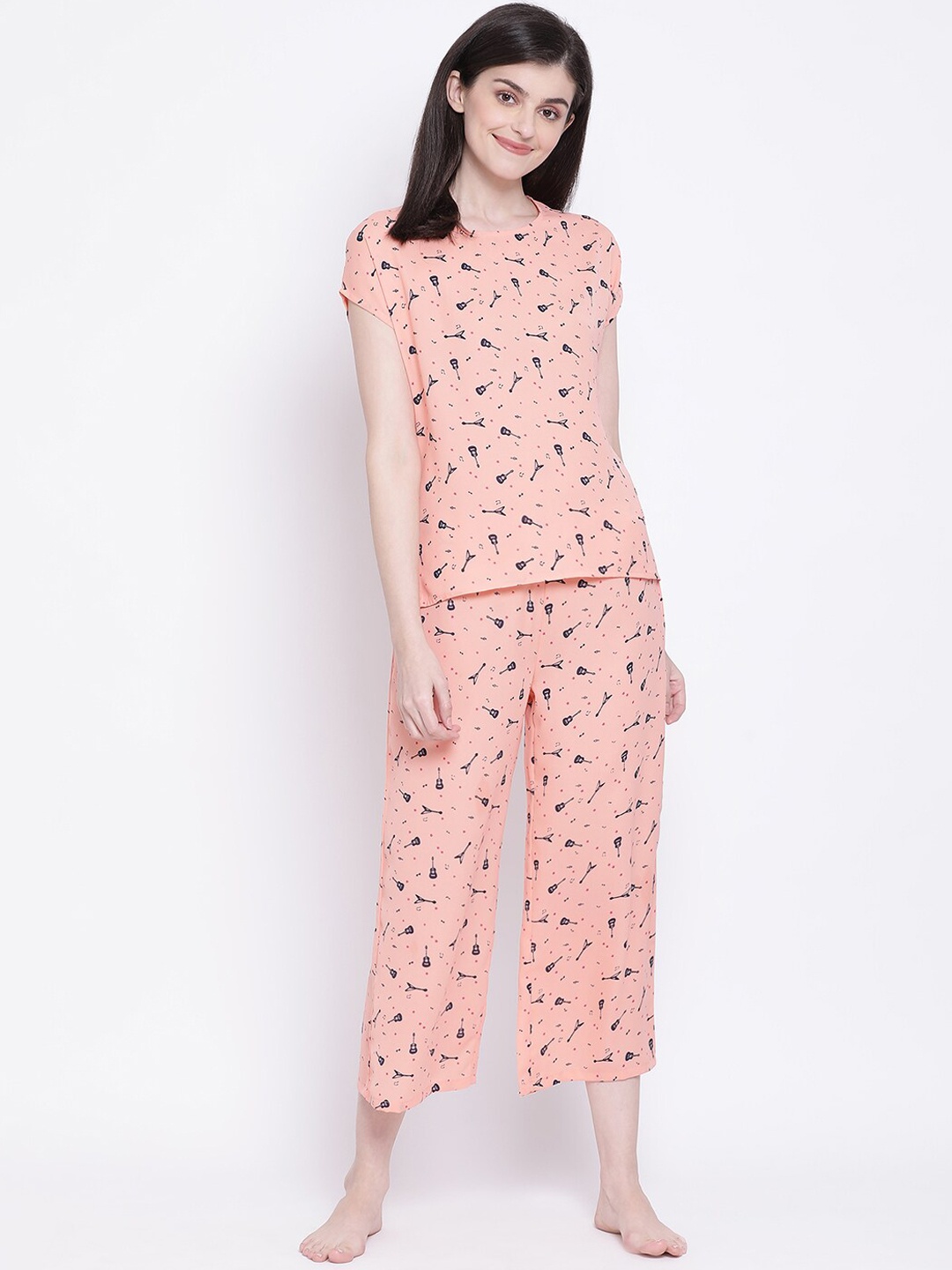 

Clovia Women Orange & Black Printed Night Suit
