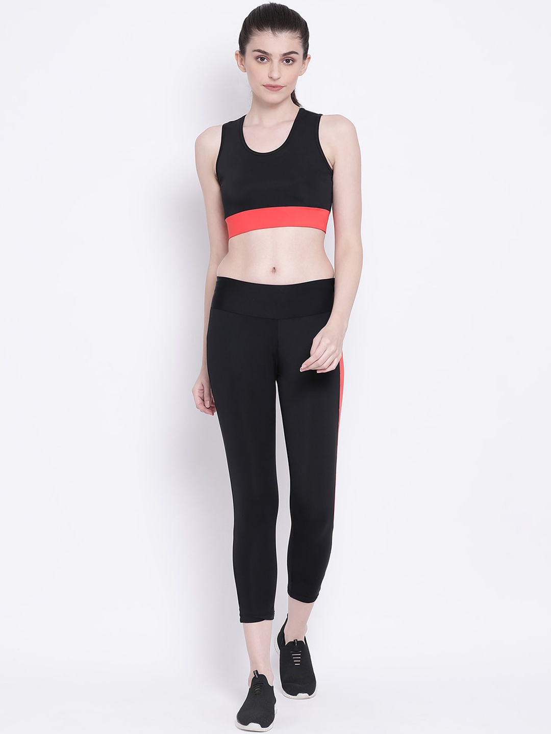 

Clovia Women Black & Orange Solid Tracksuit