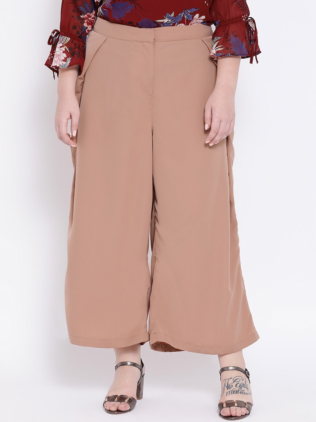 

Oxolloxo Women Beige Solid Flared Palazzos